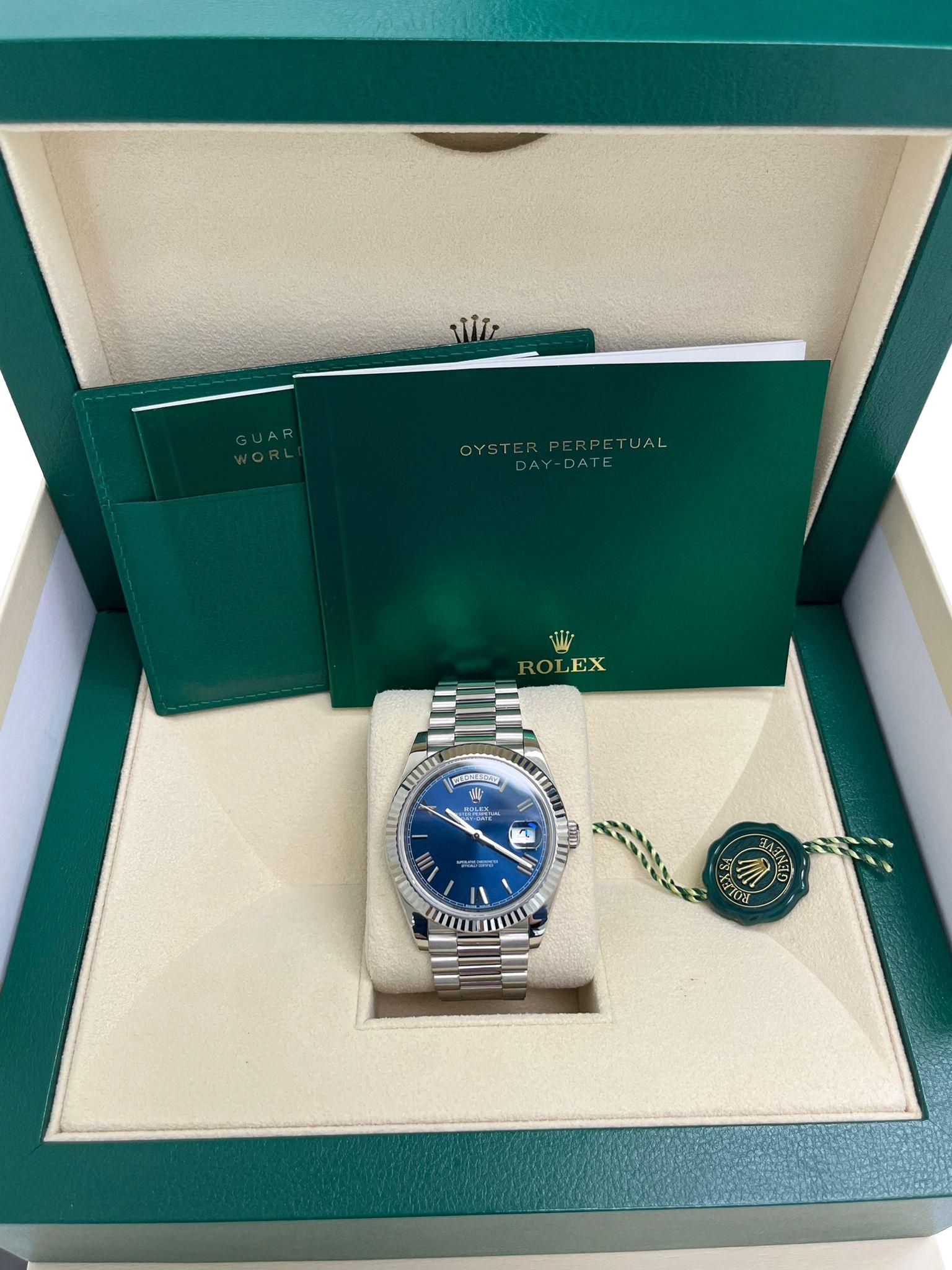Rolex Day-Date 40mm White Gold Bright Blue Roman Dial Fluted Bezel Watch 228239 In Excellent Condition For Sale In Aventura, FL