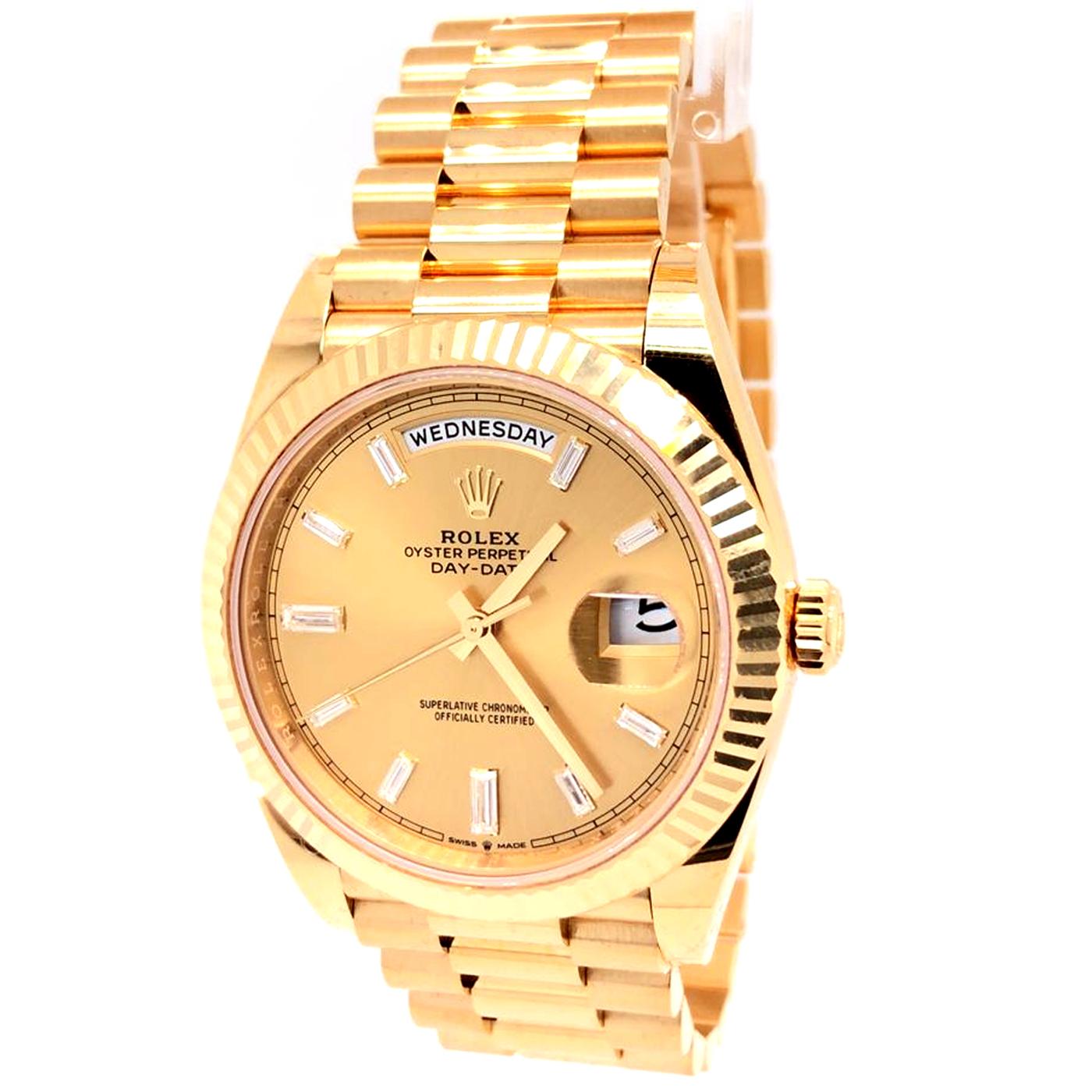 Rolex Day-Date 40mm 18K yellow gold case, screw-down back with Rolex fluting, screw-down crown with twin lock double waterproofness system, fluted bezel, scratch-resistant double anti-reflective sapphire crystal with cyclops lens over the date,
