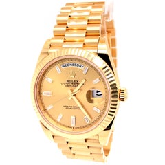 Rolex Day-Date Yellow Gold Champagne Baguette Diamond Dial President 228238
