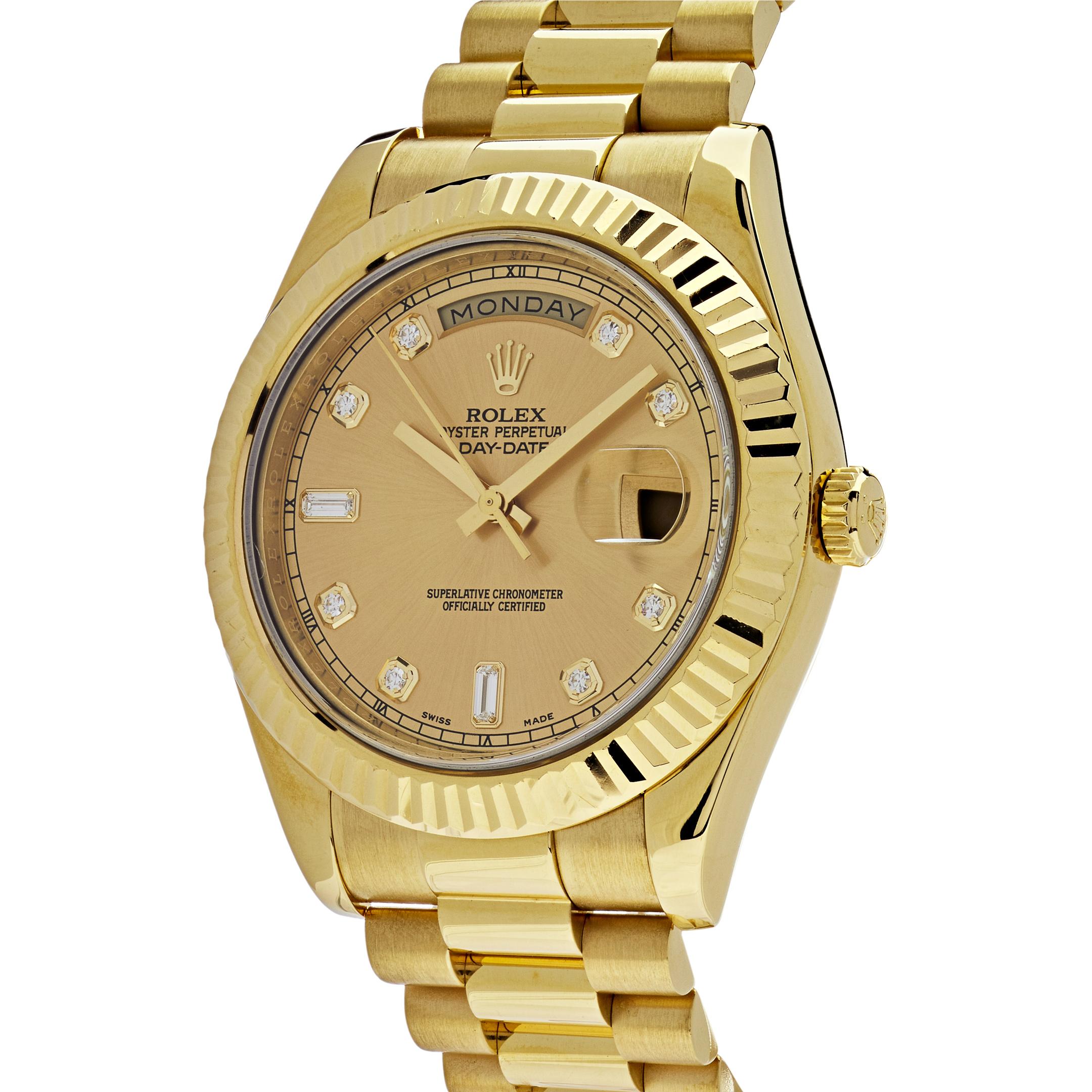 The Rolex Presidential Day-Date 41mm is inlaid in yellow gold, designed with a lavish champagne dial surrounded by diamonds, a fluted bezel and an automatic movement. The signature presidential bracelet includes, semi-circular three-piece links and