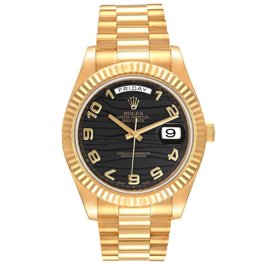 Rolex Day-Date II 41 President Yellow Gold Mens Watch 218238 Box Card. Officially certified chronometer self-winding movement. 18K yellow gold case 41 mm in diameter. High polished lugs. Rolex logo on a crown. 18K yellow gold fluted bezel. Scratch