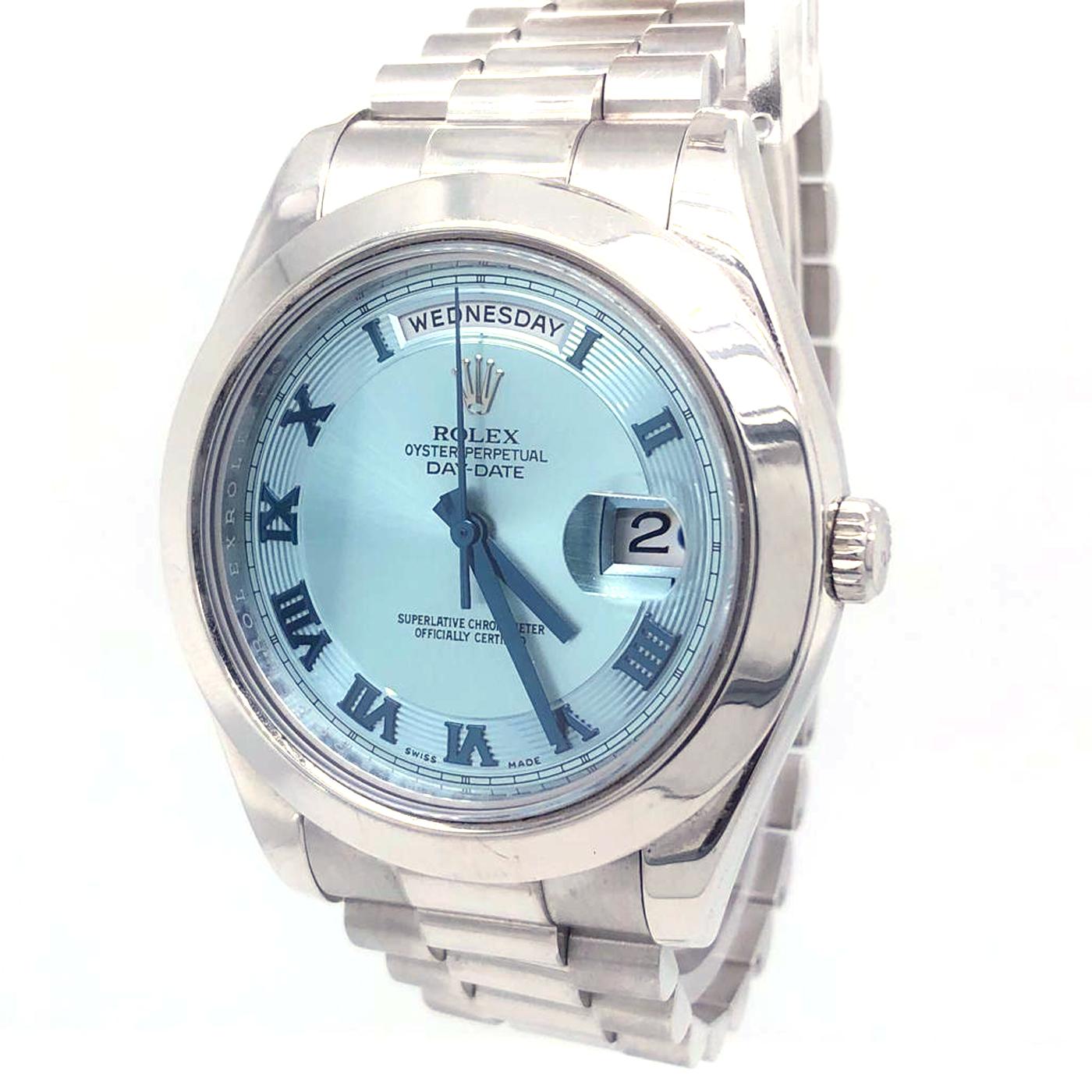 Day Date II Platinum 218206 Full Set - Full platinum, President bracelet, sky blue sunburst dial with applied roman numeral indexes, day / date indicator, sapphire glass, screw down crown, chronometer certified automatic movement (COSC). With
