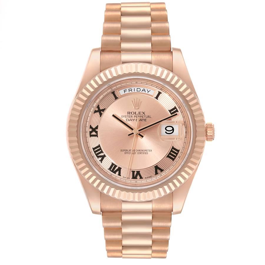 Rolex Day-Date II Everose Concentric Roman Dial Rose Gold Watch 218235 Box Card. Officially certified chronometer self-winding movement. 18K rose gold case 41.0 mm in diameter. High polished lugs. Rolex logo on a crown. 18K rose gold fluted bezel.