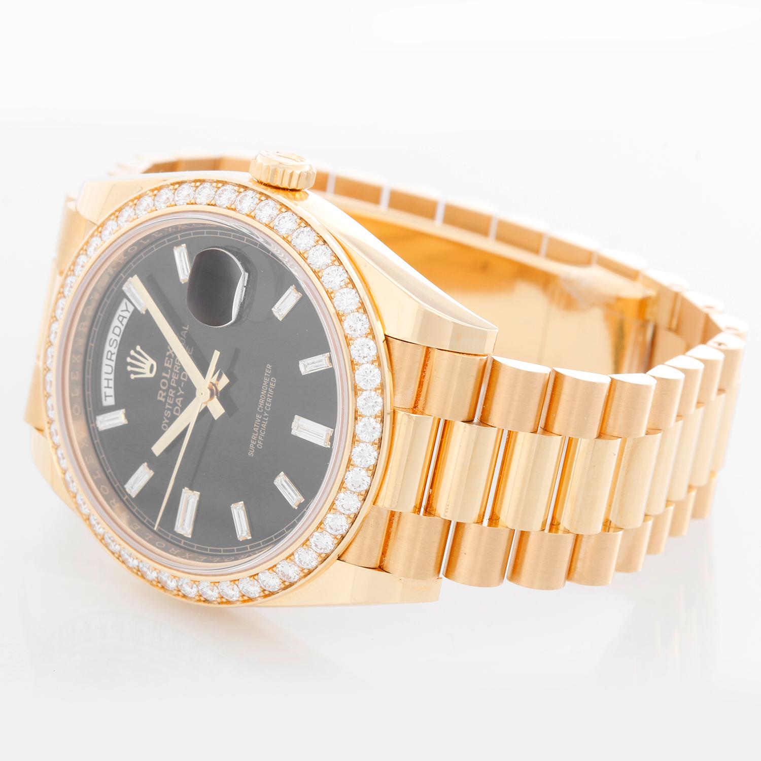 Rolex Day-Date II President 18k Yellow Gold Men's 40mm Watch 2282348 RBR - Automatic winding, 31 jewels, sapphire crystal, with day and date. 18K Yellow gold; diamond bezel  (40mm diameter). Black dial with baguette hour markers.. 18k yellow gold