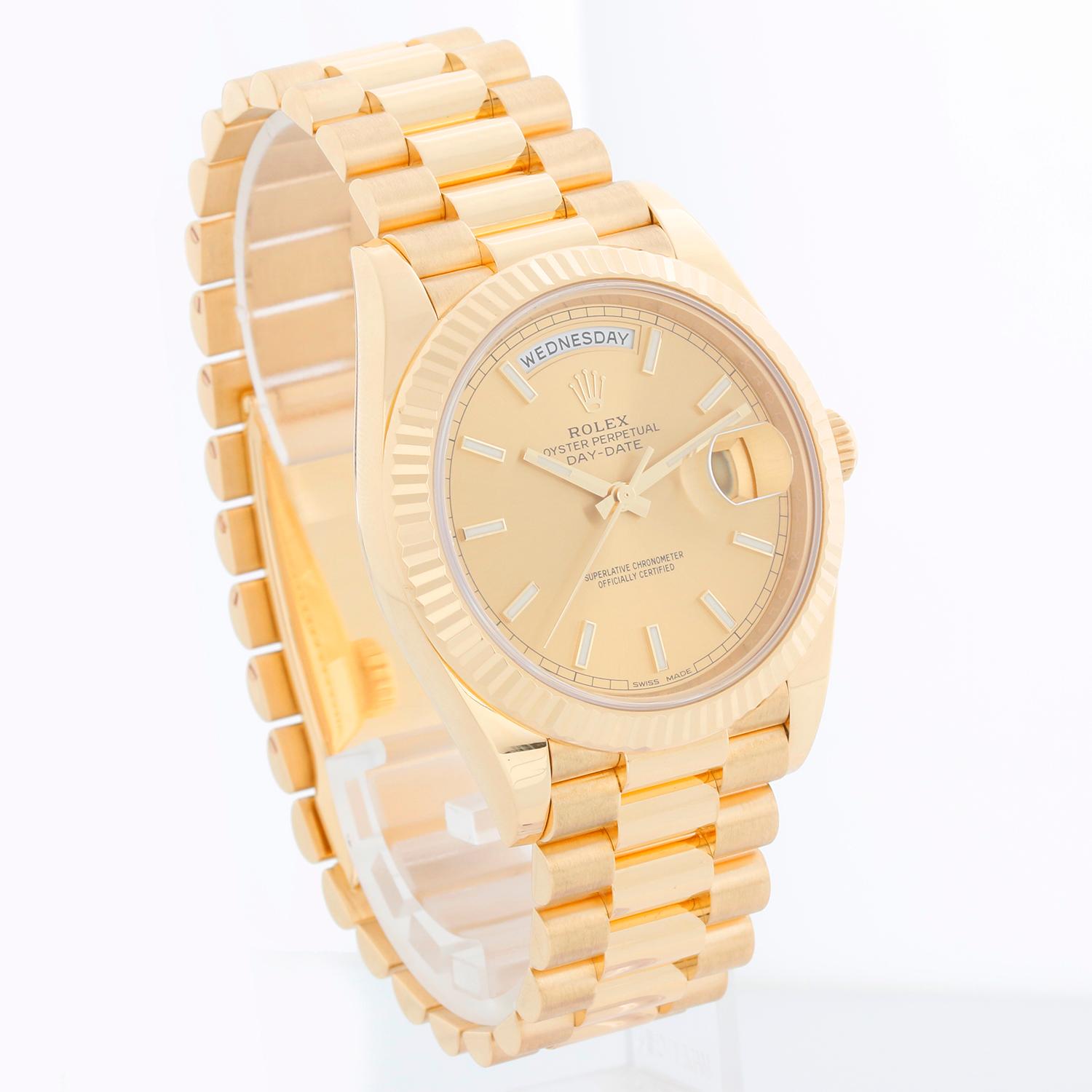 Rolex Day-Date II President 18k Yellow Gold Men's 40mm Watch 228238 - Automatic winding, 31 jewels, sapphire crystal, with day and date. 18K Yellow gold; fluted bezel  (40mm diameter). Champagne dial with luminous markers. 18k yellow gold President