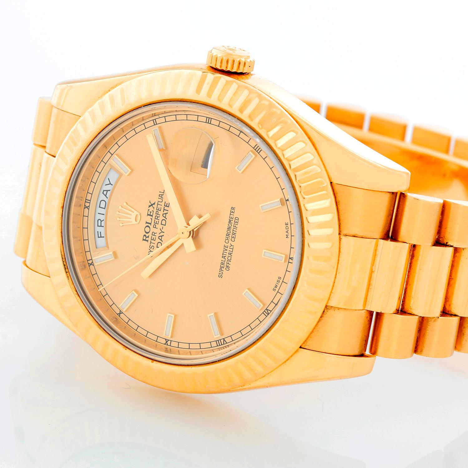 Rolex Day-Date II President 18k Yellow Gold Men's 41mm Watch 218238 - Automatic winding, 31 jewels, sapphire crystal, with day and date. 18k yellow gold case with fluted bezel (41mm diameter). Champagne dial with gold stick hour markers. 18k yellow