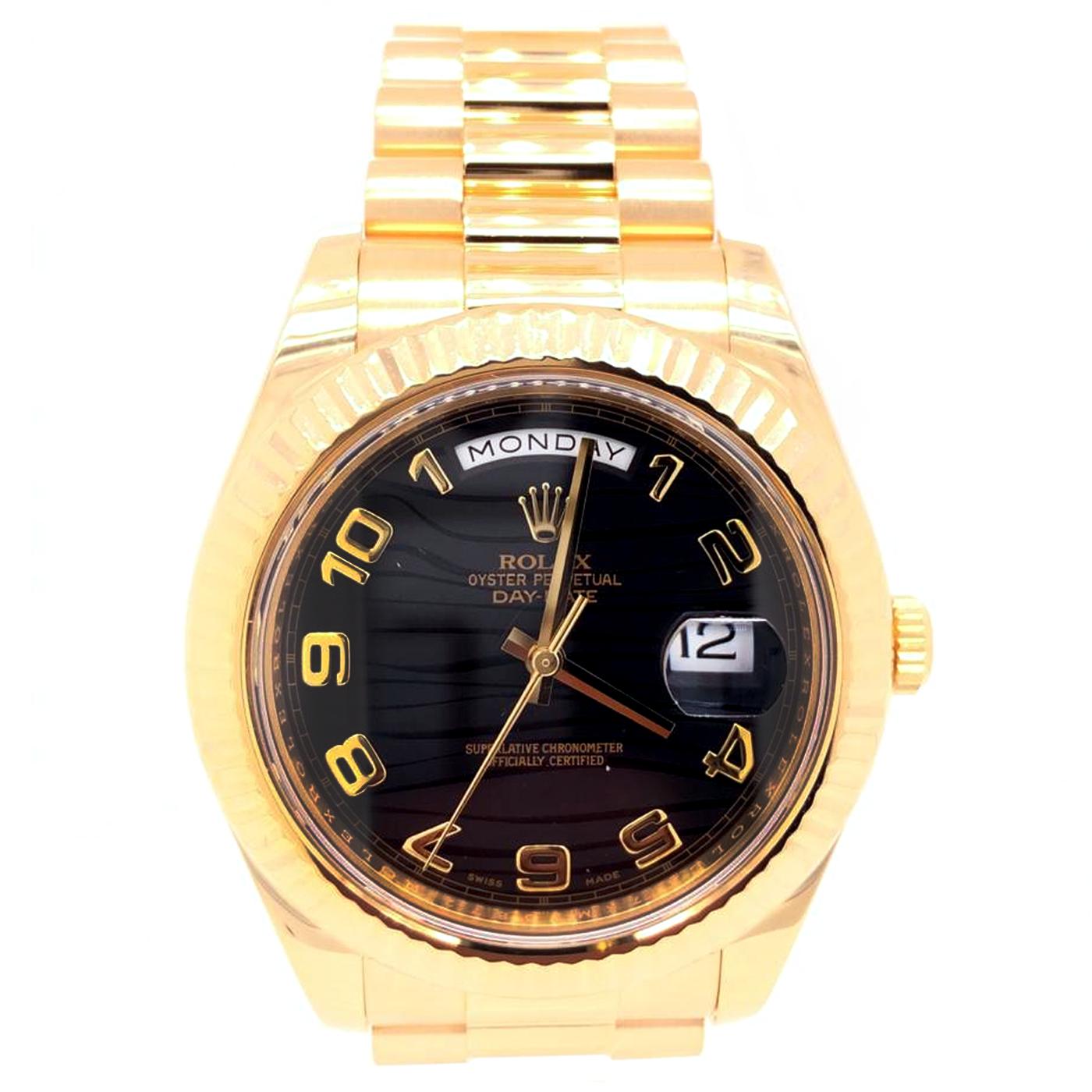 Rolex Oyster Perpetual Day-Date II Watches. The Rolex President. 218238 41mm 18K yellow gold case, fluted bezel, black wave dial, Arabic numerals, and President Bracelet. This is the New Model Rolex Presidential “The Day-Date II”.This Model features