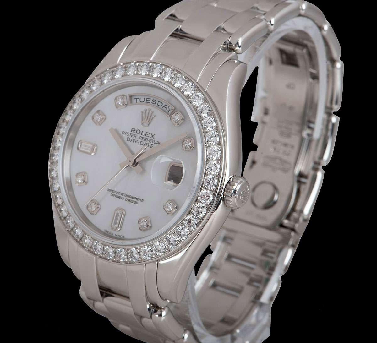 A 39 mm Platinum Oyster Perpetual Day-Date Masterpiece Gents Wristwatch, white mother of pearl dial set with 8 applied round brilliant cut diamond hour markers and 2 applied baguette cut diamond hour markers, day at 12 0'clock, date at 3 0'clock, a