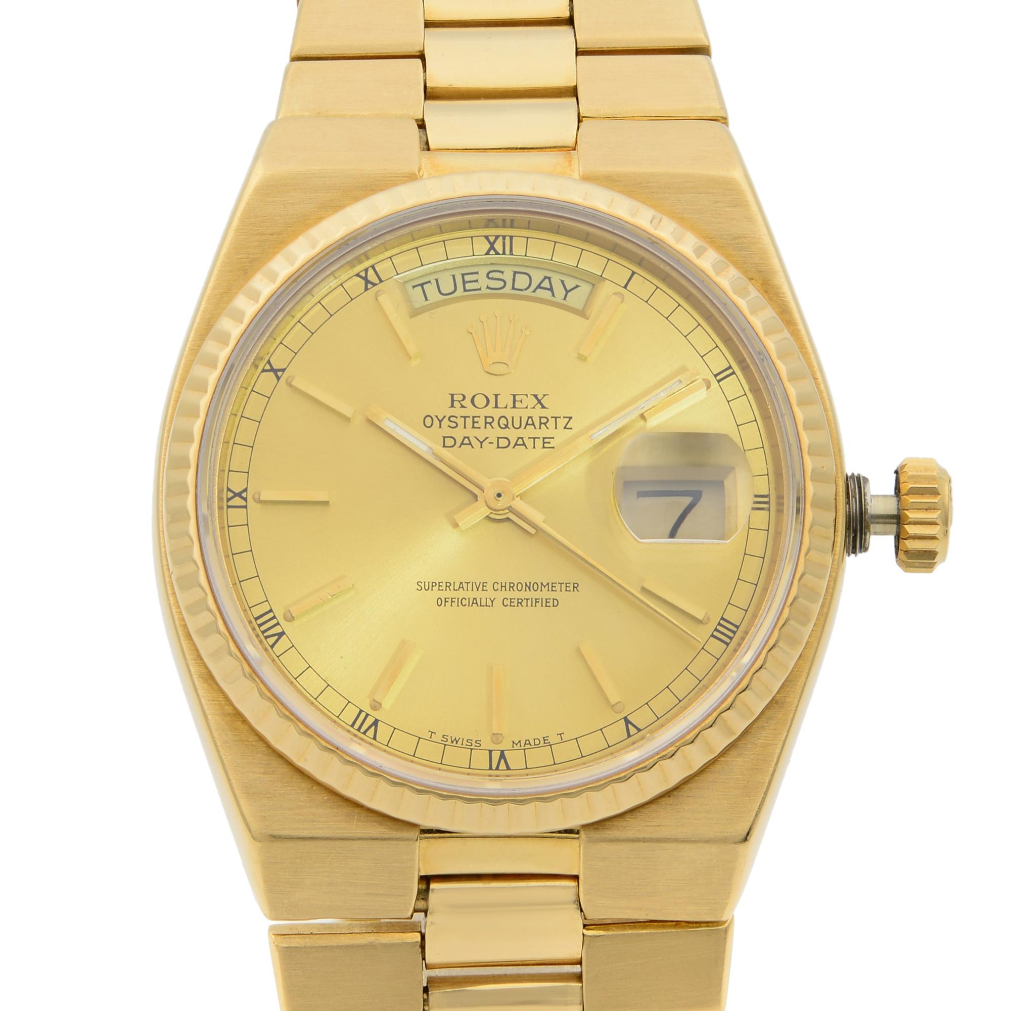 This pre-owned Rolex Day-Date Oysterquartz 19018 is a beautiful men's timepiece that is powered by quartz (battery) movement which is cased in a yellow gold case. It has a tonneau shape face, day & date dial and has hand sticks style markers. It is