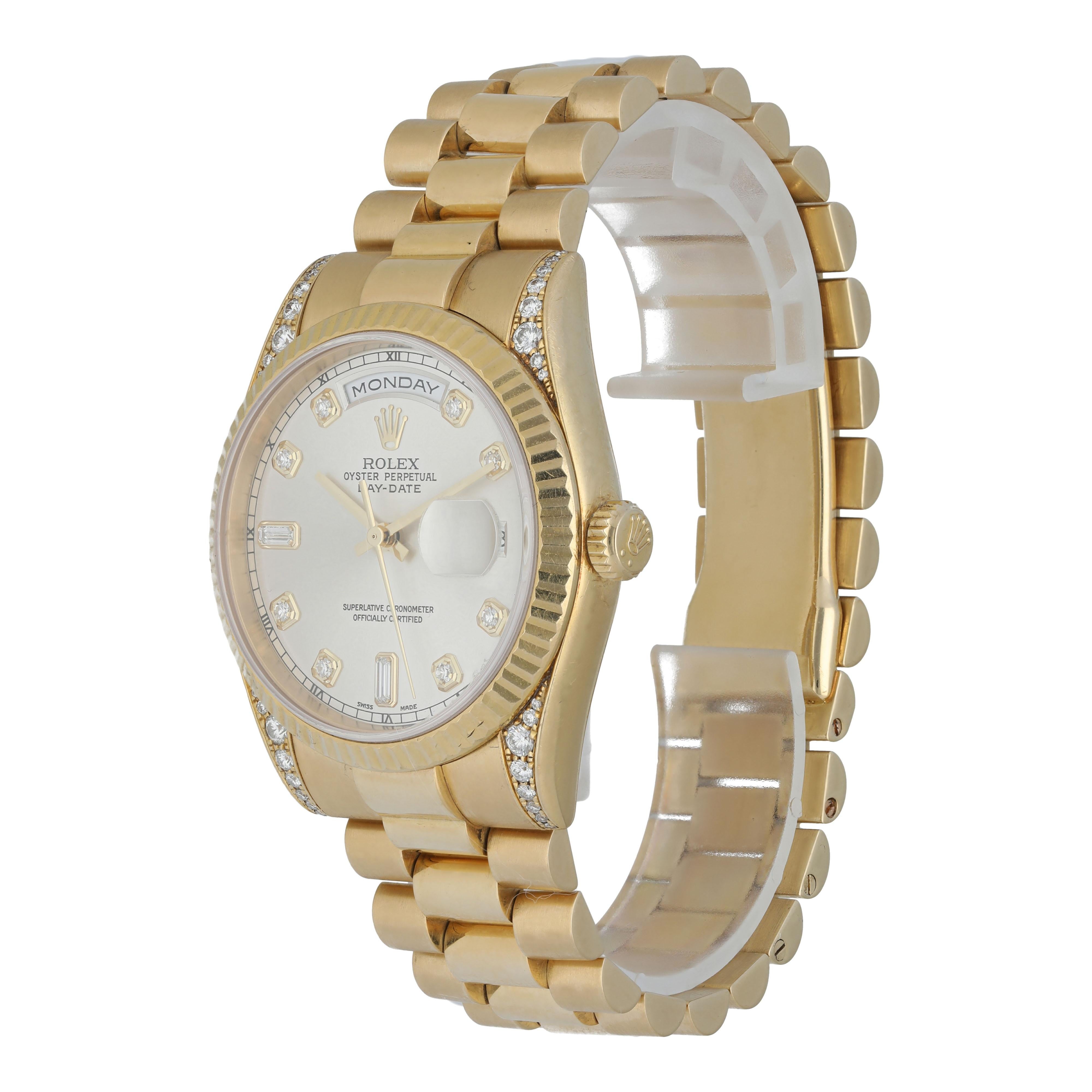 Rolex Day-Date President 118338 Diamond Dial Men's Watch.
36mm 18k Yellow gold case With factory set diamonds. 
Yellow Gold fluted bezel. 
Silver dial with gold hands and factory set diamond hour markers. 
Minute markers on the outer dial. 
Date