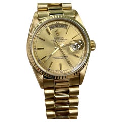 Rolex Montre President 18038 champagne cadran en or jaune 18 carats 36 mm