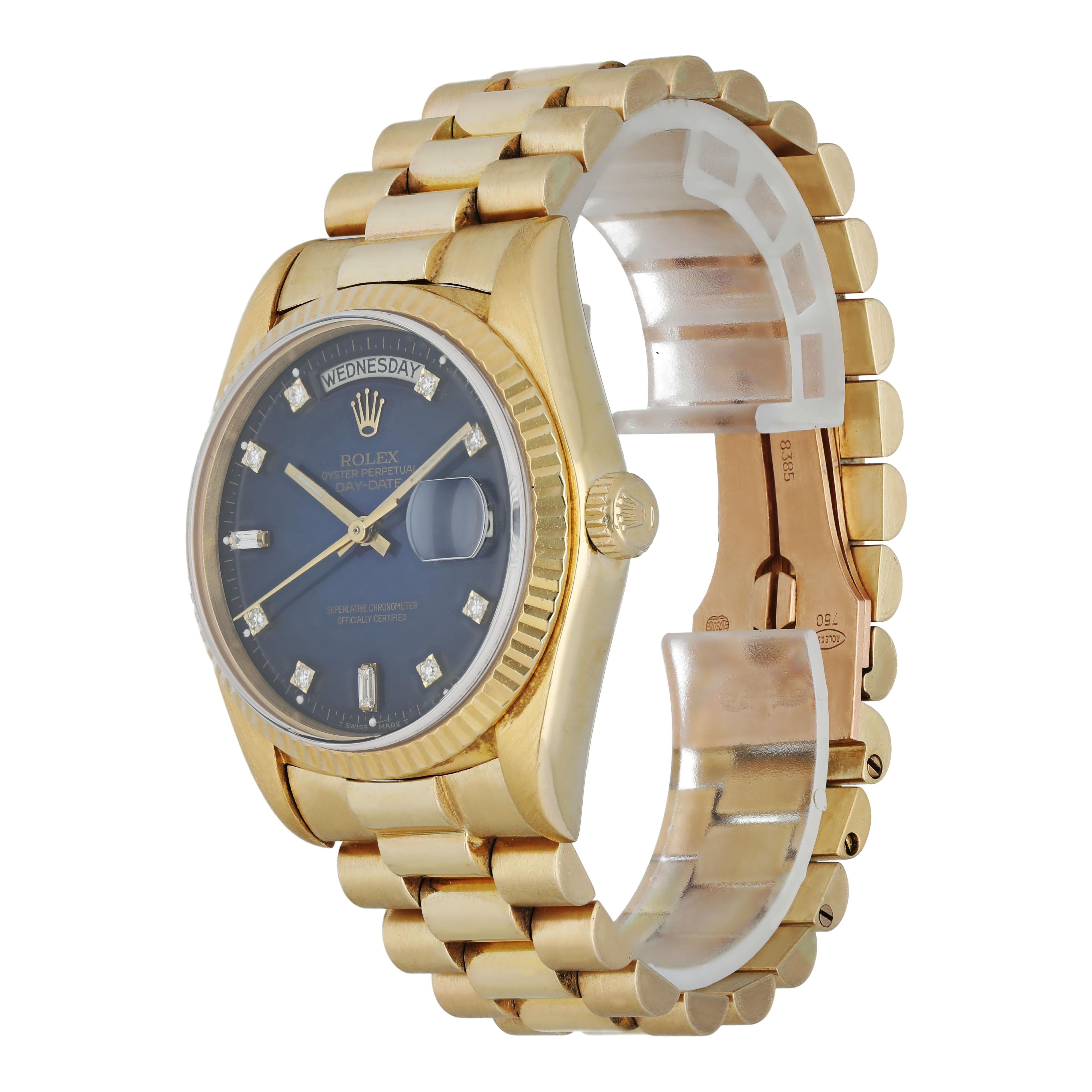 Rolex Day-Date President 18038 Yellow Gold Men's Watch.
36mm 18k Yellow gold case. 
Yellow Gold fluted bezel. 
Blue vignette dial with gold luminous hands and factory set diamond hour markers. 
Minute markers on the outer dial. 
Date display at the