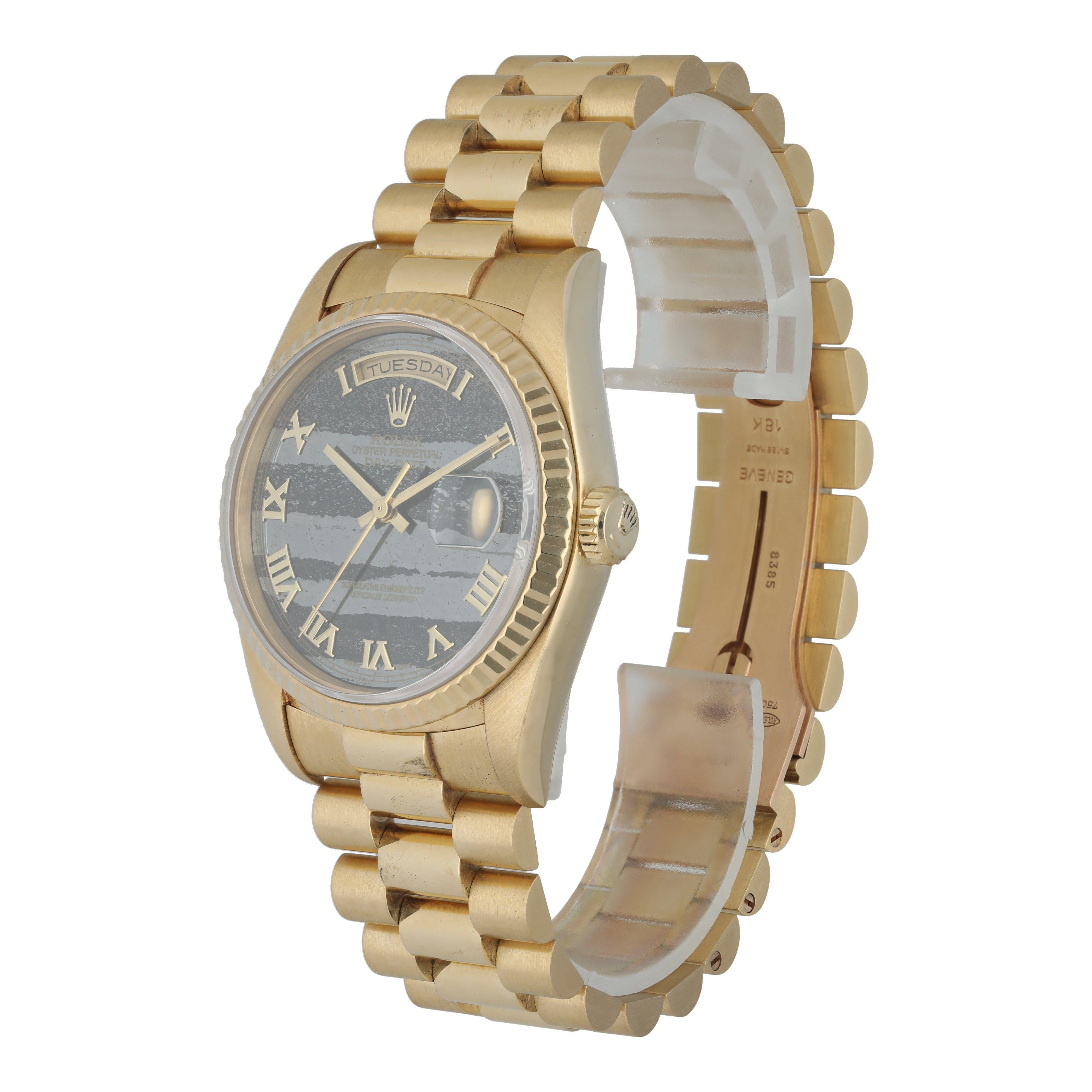 Rolex Day-Date President 18238 Men's Watch. 36mm 18k yellow gold case with gold fluted bezel. Black ferrite stone dial with gold hands and Roman numeral hour markers. Double quickset date function. Yellow gold President bracelet with a fold-over