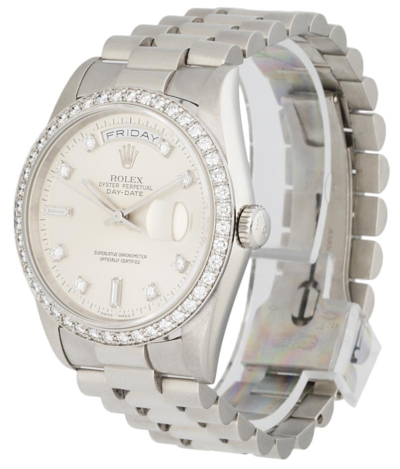 Rolex Day-Date President 18346 Platinum Diamond Men's Watch. 36mm platinum case with platinum diamond bezel. Silver dial with platinum hands and factory diamond hour markers. Minute markers around the outer dial. Date display at the 3 o'clock