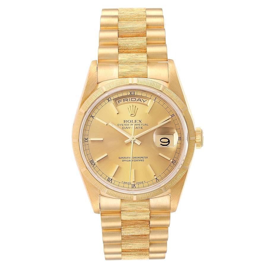 Rolex Day-Date President 36mm Yellow Gold Bark Finish Mens Watch 18248. Officially certified chronometer self-winding movement. 18k yellow gold oyster case 36 mm in diameter. Rolex logo on a crown. 18k yellow gold bark finish bezel. Scratch
