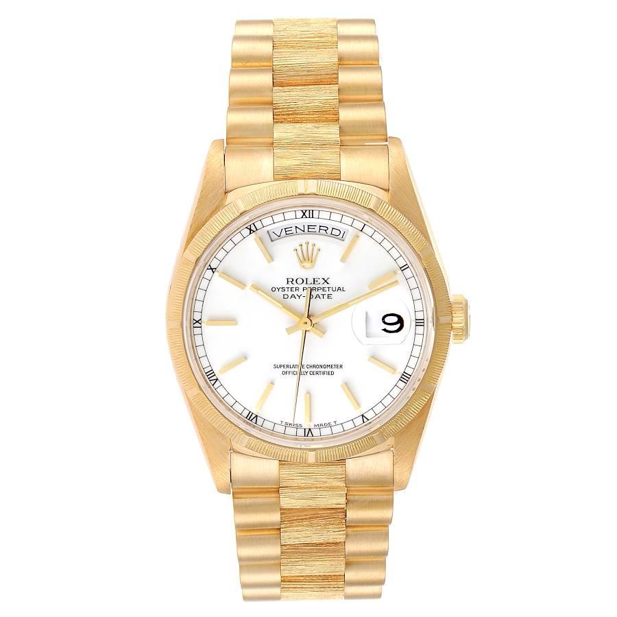 Rolex Day-Date President 36mm Yellow Gold Bark Finish Mens Watch 18248. Officially certified chronometer self-winding movement. 18k yellow gold oyster case 36 mm in diameter.  Rolex logo on a crown. 18k yellow gold bark finish bezel. Scratch