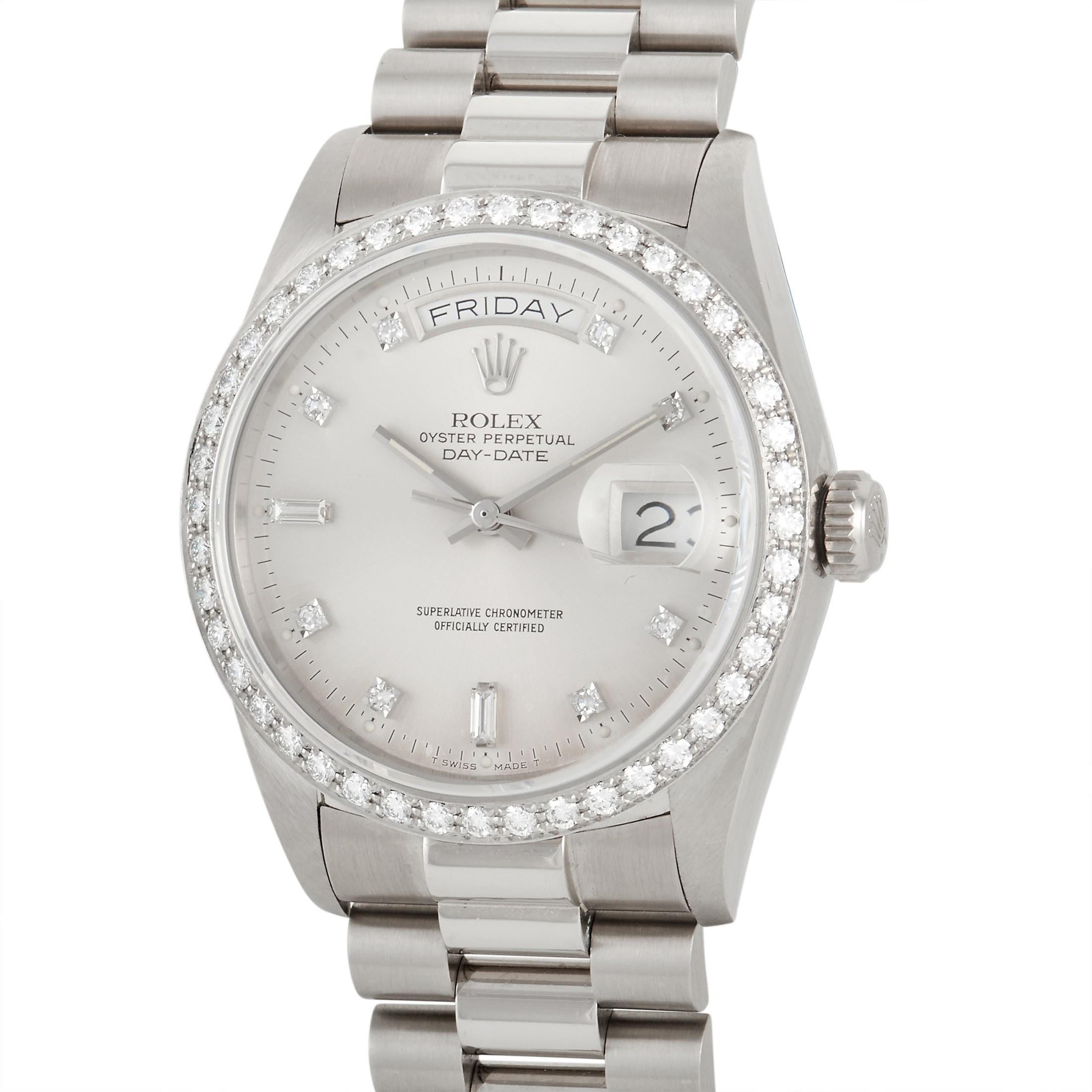 The Rolex Day-Date President Diamond Watch, reference number 18049, is breathtaking in its craftsmanship. 

This impeccable timepiece includes an 18K white gold 36mm case, an 18K white gold president bracelet, and a fixed 18K white gold diamond-set
