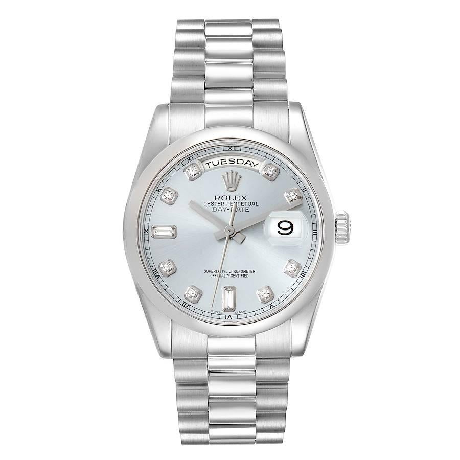 Rolex Day-Date President Platinum Ice Blue Diamond Dial Mens Watch 118206. Officially certified chronometer automatic self-winding movement with quickset date function. Platinum oyster case 36.0 mm in diameter. Rolex logo on the crown. Platinum