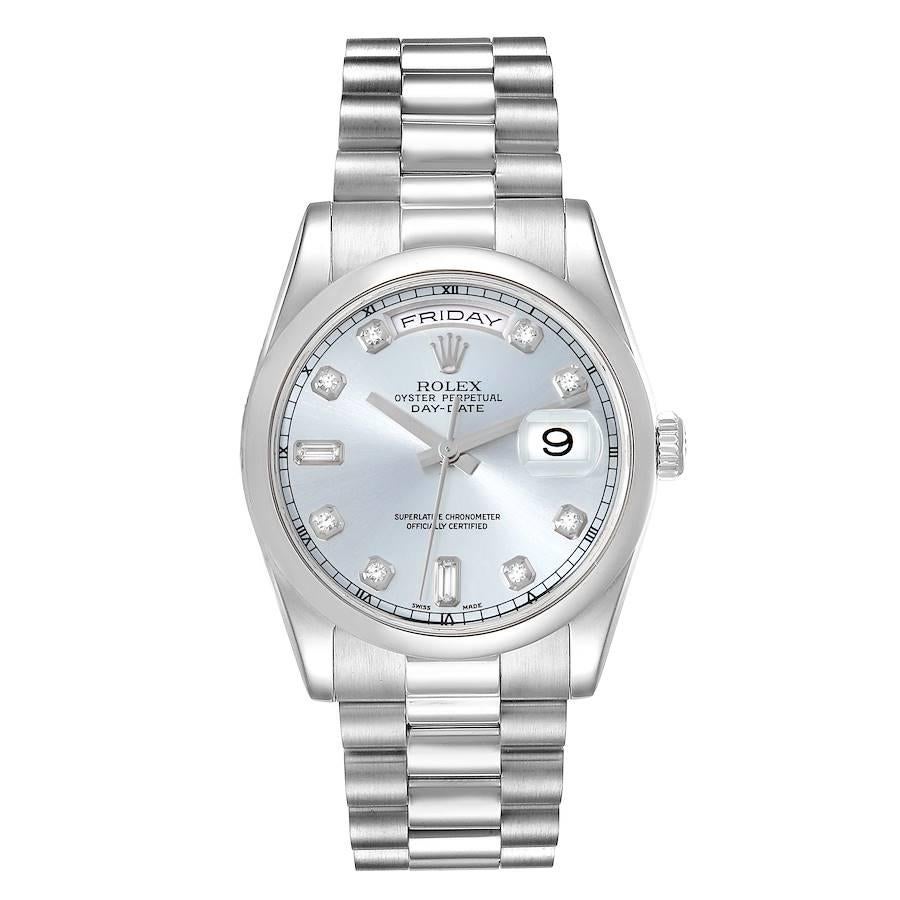 Rolex Day-Date President Platinum Ice Blue Diamond Dial Watch 118206 Box Papers. Officially certified chronometer automatic self-winding movement with quickset date function. Platinum oyster case 36.0 mm in diameter. Rolex logo on the crown.