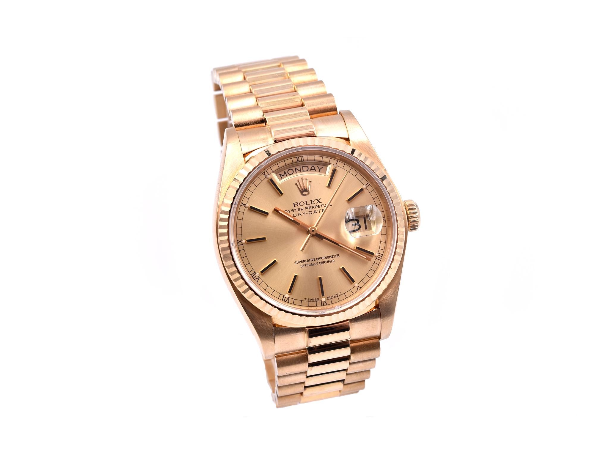 Movement: automatic
Function: hours, minutes, seconds, day, date
Case: 36mm round 18k yellow gold case with 18k yellow gold fluted bezel, sapphire protective crystal, screw-down crown, water resistant to 100 meters
Band: 18k yellow gold presidential