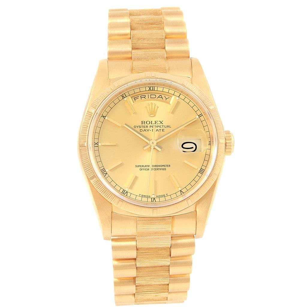 Rolex Day-Date President 36mm Yellow Gold Bark Finish Mens Watch 18248. Officially certified chronometer automatic self-winding movement. 18k yellow gold oyster case 36 mm in diameter. Rolex logo on a crown. 18k yellow gold bark finish bezel.