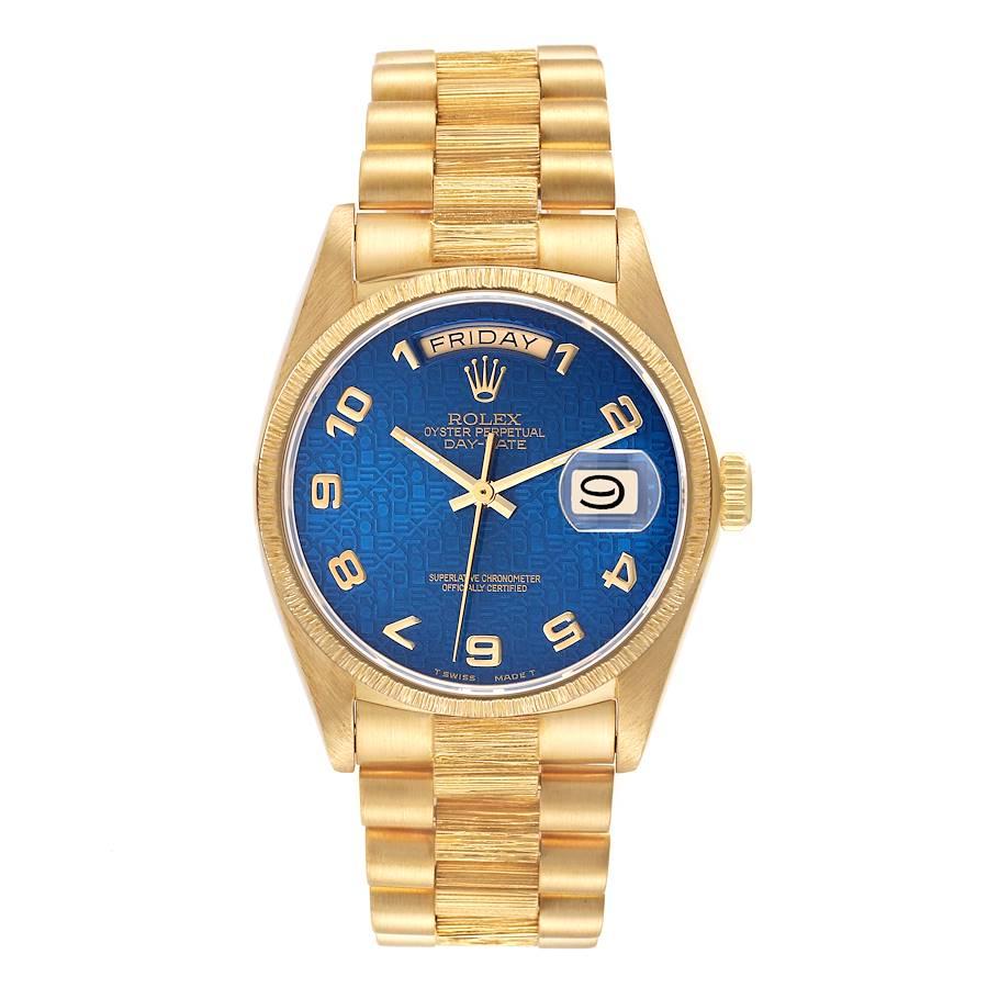 Rolex Day-Date Präsident Gelbgold blaues Zifferblatt Bark Finish Herrenuhr 18078. Offiziell zertifiziertes Chronometer-Automatikwerk mit automatischem Aufzug. Oyster-Gehäuse aus 18 Karat Gelbgold mit einem Durchmesser von 36,0 mm. Rolex Logo auf der
