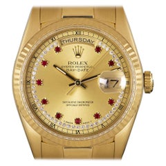 Montre automatique Rolex Day-Date Rare Or Jaune Diamant & Cadran Rubis String 18238