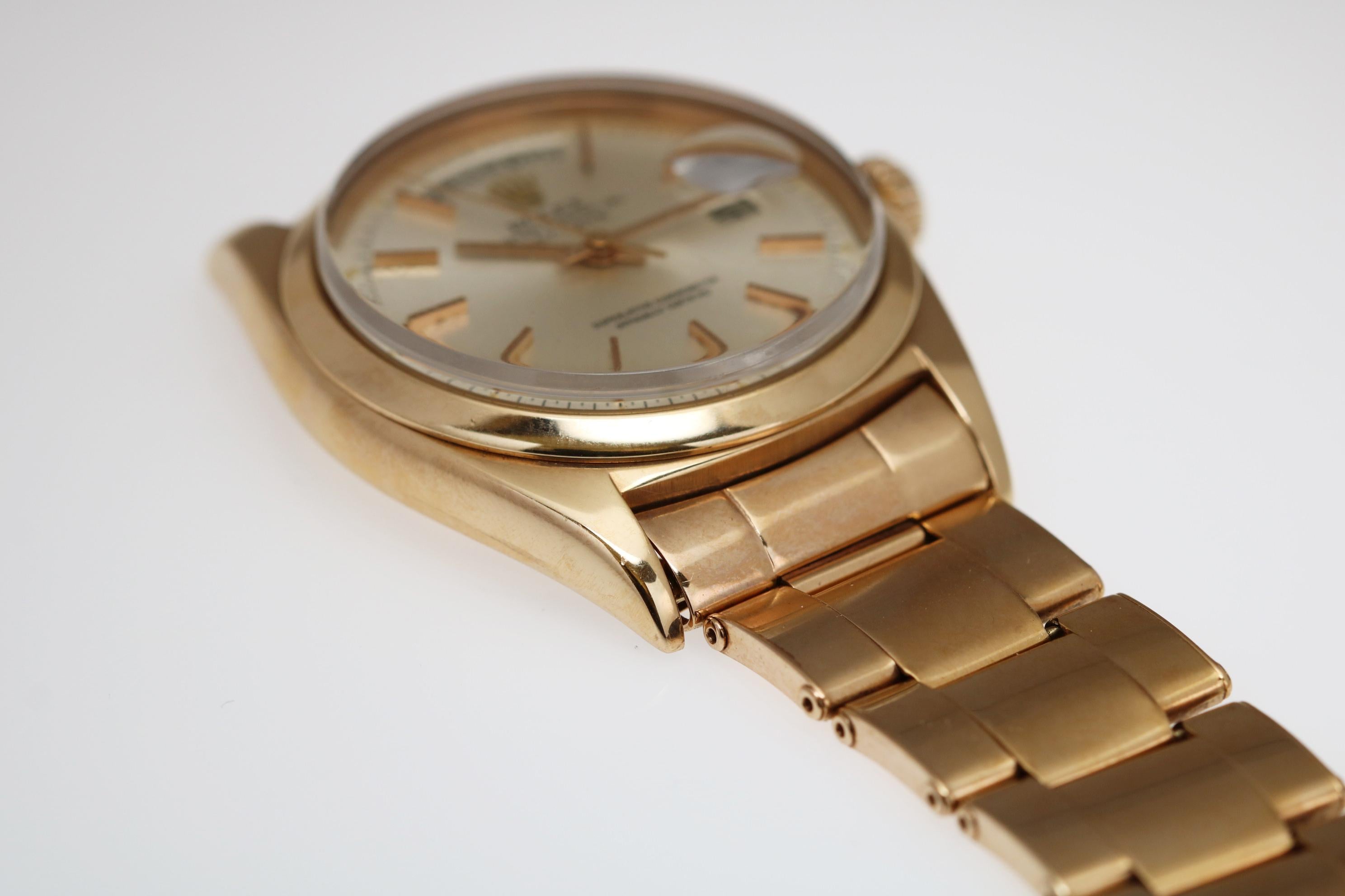 Rolex 18k Rose Gold Day-Date Rose Gold Ref 1802 Wristwatch, circa 1968 In Good Condition In Miami Beach, FL