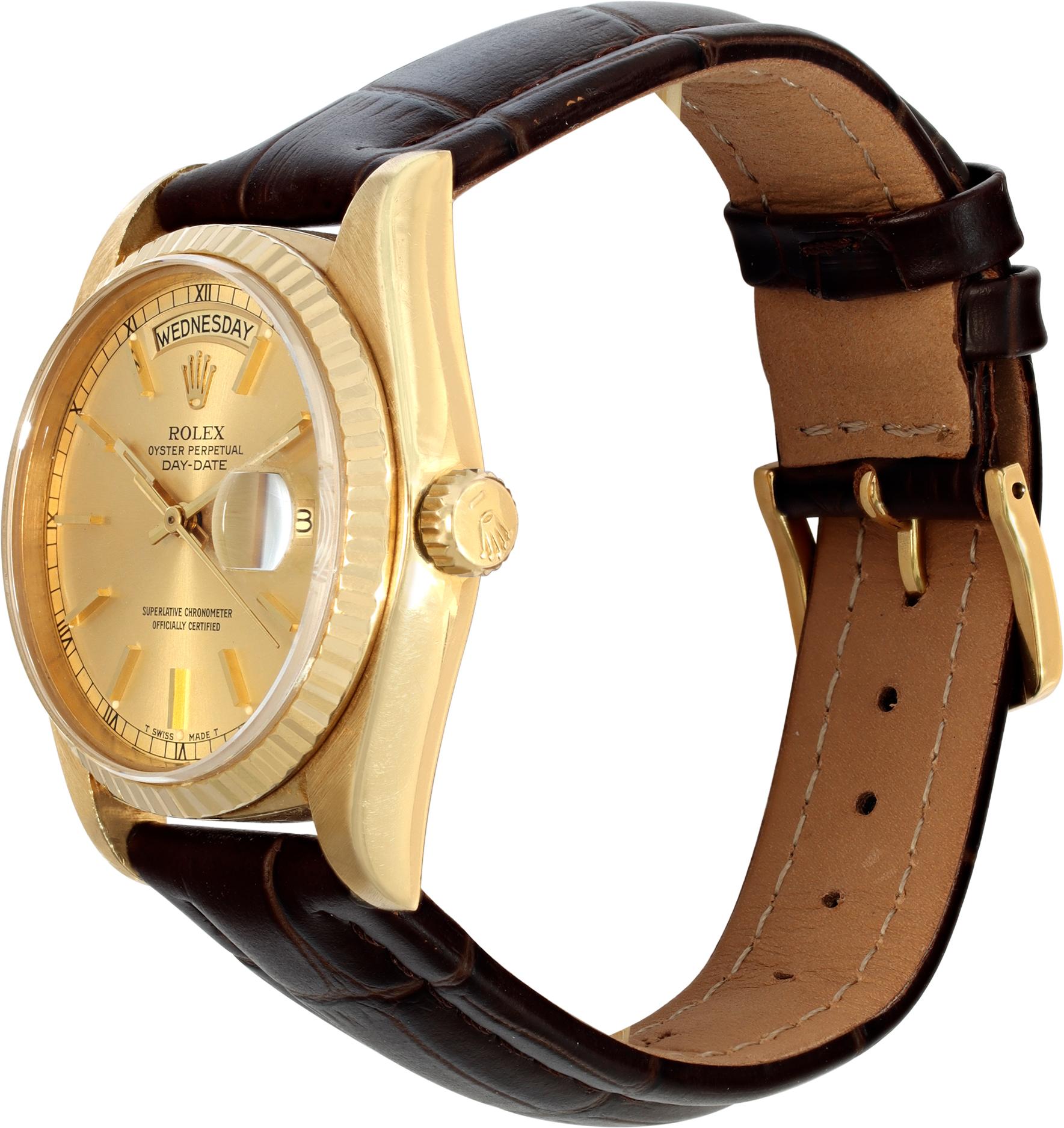Rolex Day-Date in 18k yellow gold on a brown alligator grain strap. Auto w/ sweep seconds, date and day. 36 mm case size. Ref 18038. Circa 1978. ** Bank Wire Only at this Price ** Fine Pre-owned Rolex Watch.

 Certified preowned Classic Rolex