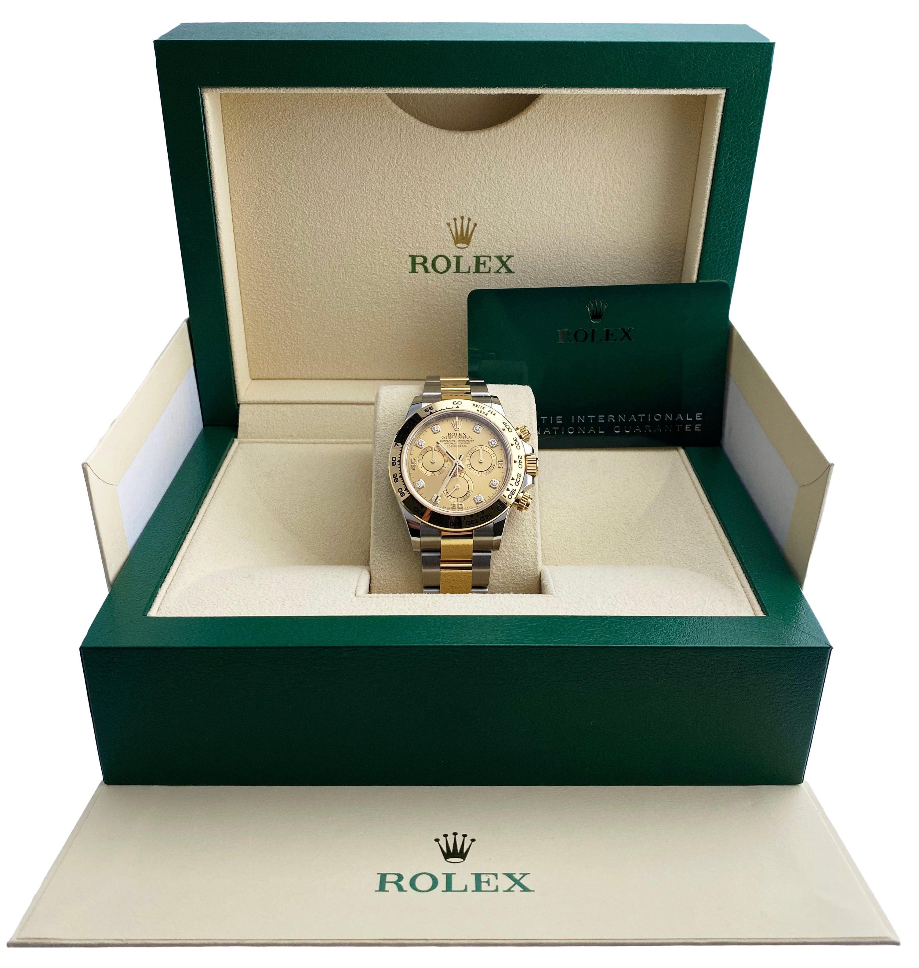 
Rolex Daytona 116503 Mens Watch. 40mm stainless steel case with 18K yellow gold bezel. Champagne diamond dial with luminous hands and index hour marker. Three black sub-dials. Small seconds hand at 6 o'clock. 30-minute counter at 3 o'clock. 12-hour