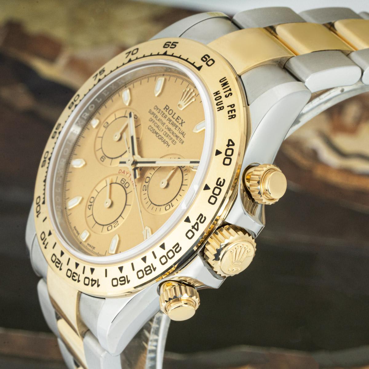 An unworn 116503 Daytona by Rolex in stainless steel and yellow gold. Featuring a champagne dial with applied hour markers. With an engraved tachymetric scale, three counters and pushers; the Daytona was designed to be the ultimate timing tool for