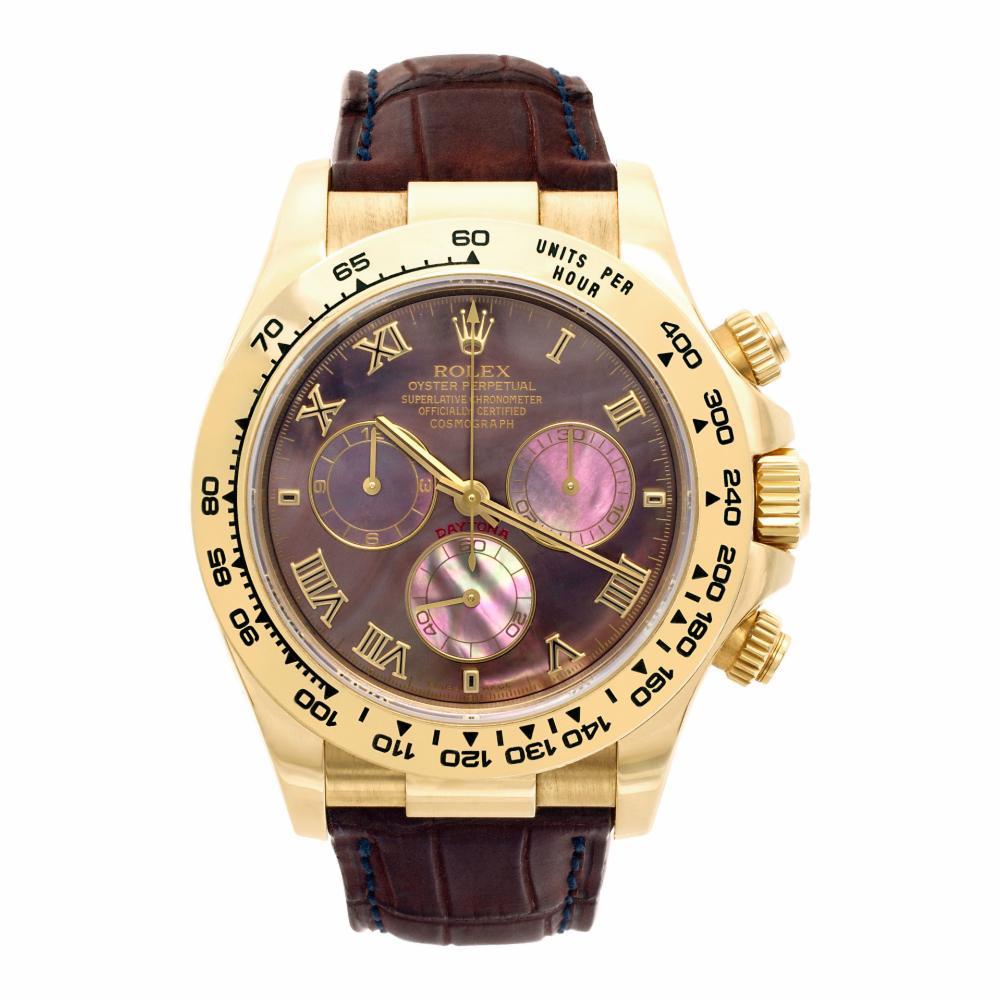 Rolex Daytona Reference #:116518. Rolex Daytona in 18k gold on leather strap with Black Mother of Pearl dial set with yellow gold applied Roman numerals hour markers with Rolex fliplock deployant buckle. Auto w/ subseconds and chronograph.Circa