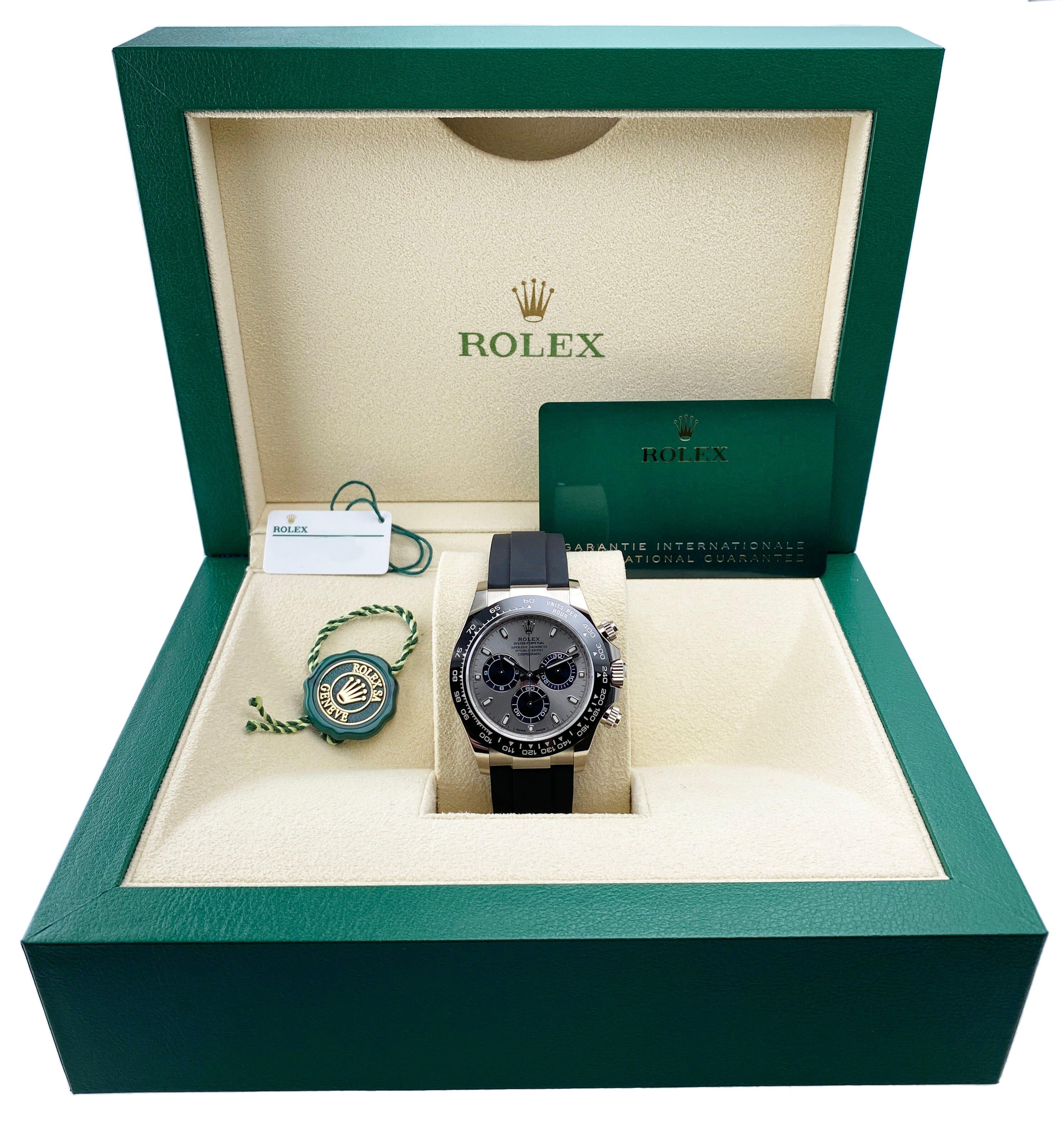 Rolex Oyster Perpetual Daytona Cosmograph 116519LN Mens Watch. 40mm 18K white gold case. Ceramic tachymeter bezel with black plexiglas insert. Steel and bright black dial with luminous hands and index hour markers. Three sub-dials. Small seconds