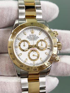 Rolex Daytona 116523, cadran blanc 18 carats, or jaune, acier inoxydable et papier de boîte