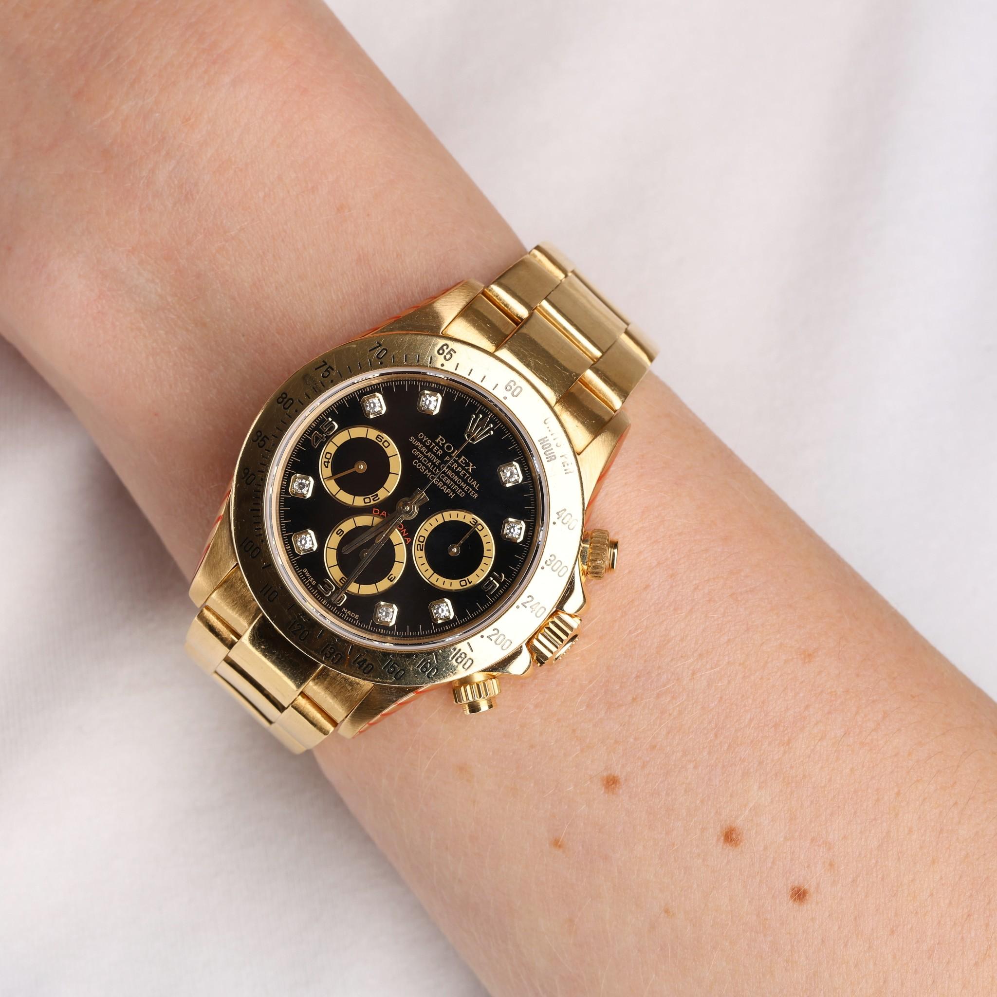 Rolex Daytona 18k Gold Diamond Dot Dial

1999 Model - Solid 18k Yellow gold Daytona watch with chronograph black face and diamond dot dial.

Solid gold bracelet with folding clasp closure Sapphire crystal face and automatic movement.

This watch has