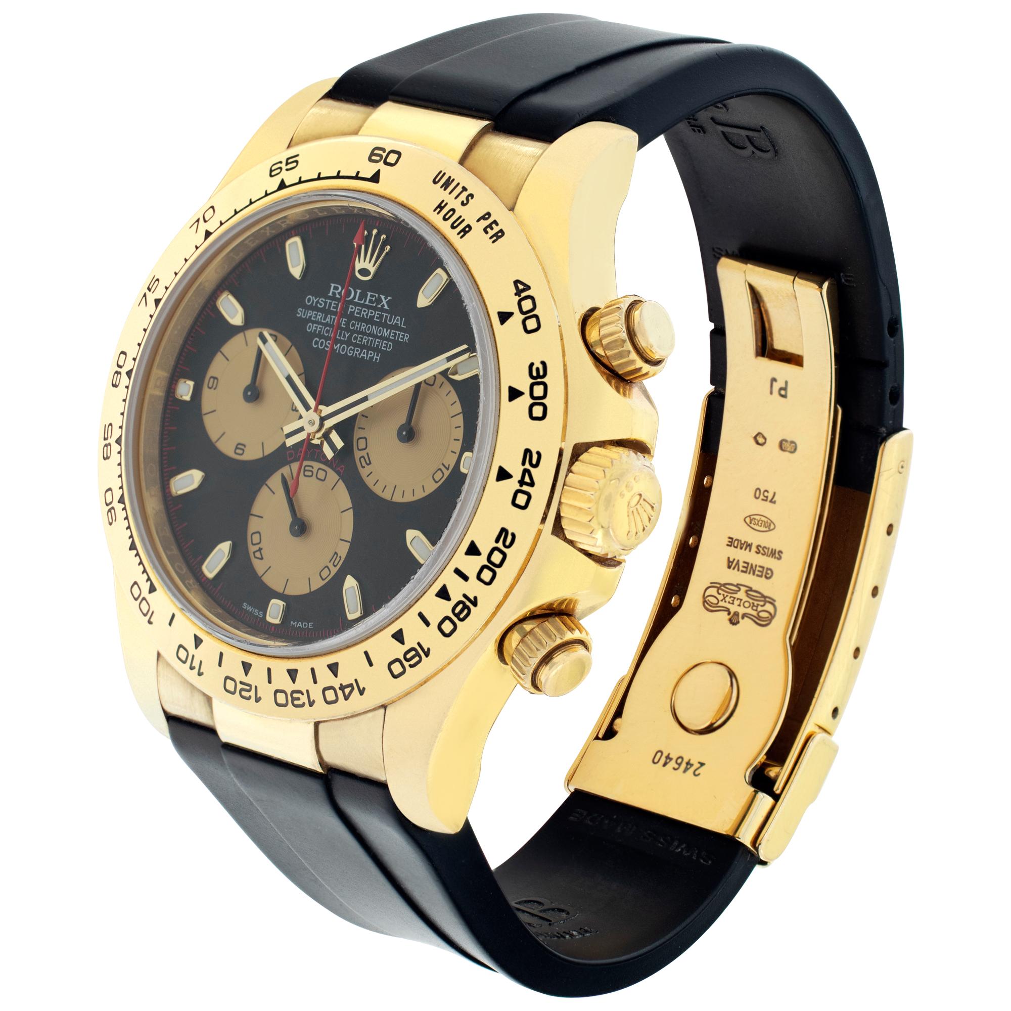 Unpolished, with original signs of wear. Rolex Daytona with a Paul Newman Dial in 18k yellow gold on a custom Rubber B black rubber strap with original Rolex 18k deployant buckle. Auto w/ sweep seconds and chronograph. 40 mm case size. Circa 2007.