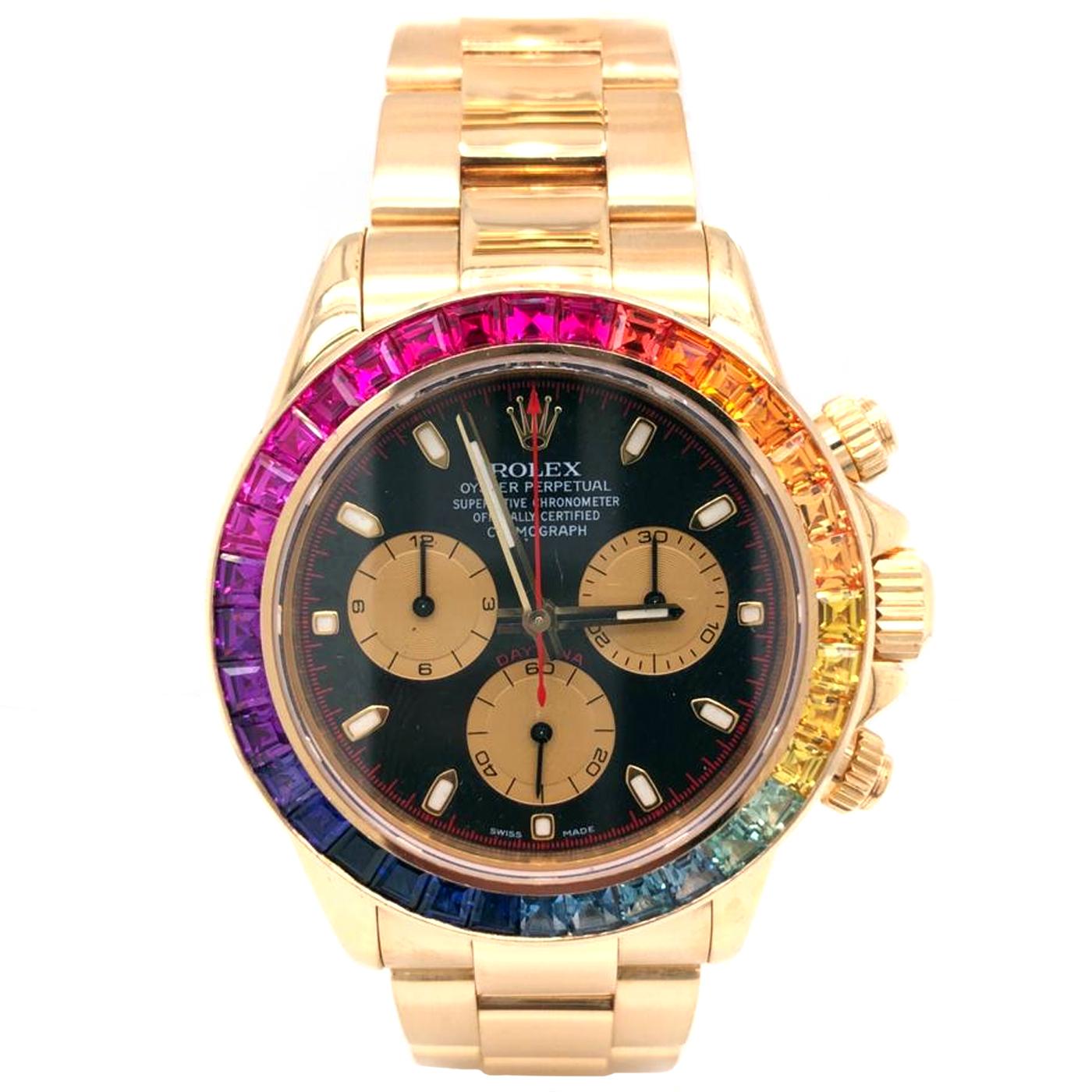 Rolex Daytona Yellow Gold Custom Bezel and Black Dial Automatic Watch 116528. The bezel is 14k Gold. This Beautiful Timepiece is Powered by an Automatic Movement that Features: 18k Yellow Gold Bracelet, 18k Gold Bezel with Rainbow Bezel, Black Dial.