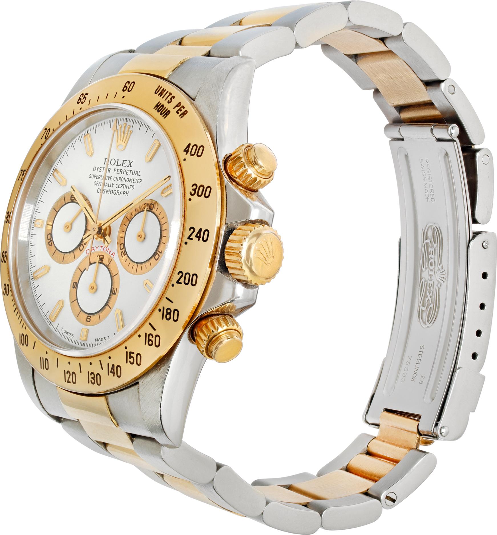 Rolex Daytona Zenith In 18k Yellow Gold & Stainless Steel. Auto w/ subseconds and chronograph. 40 mm case size. With papers. Circa 1998. Ref 16523. *Bank Wire Price Only* Fine Pre-owned Rolex Watch.

 Certified preowned Sport Rolex Daytona 16523
