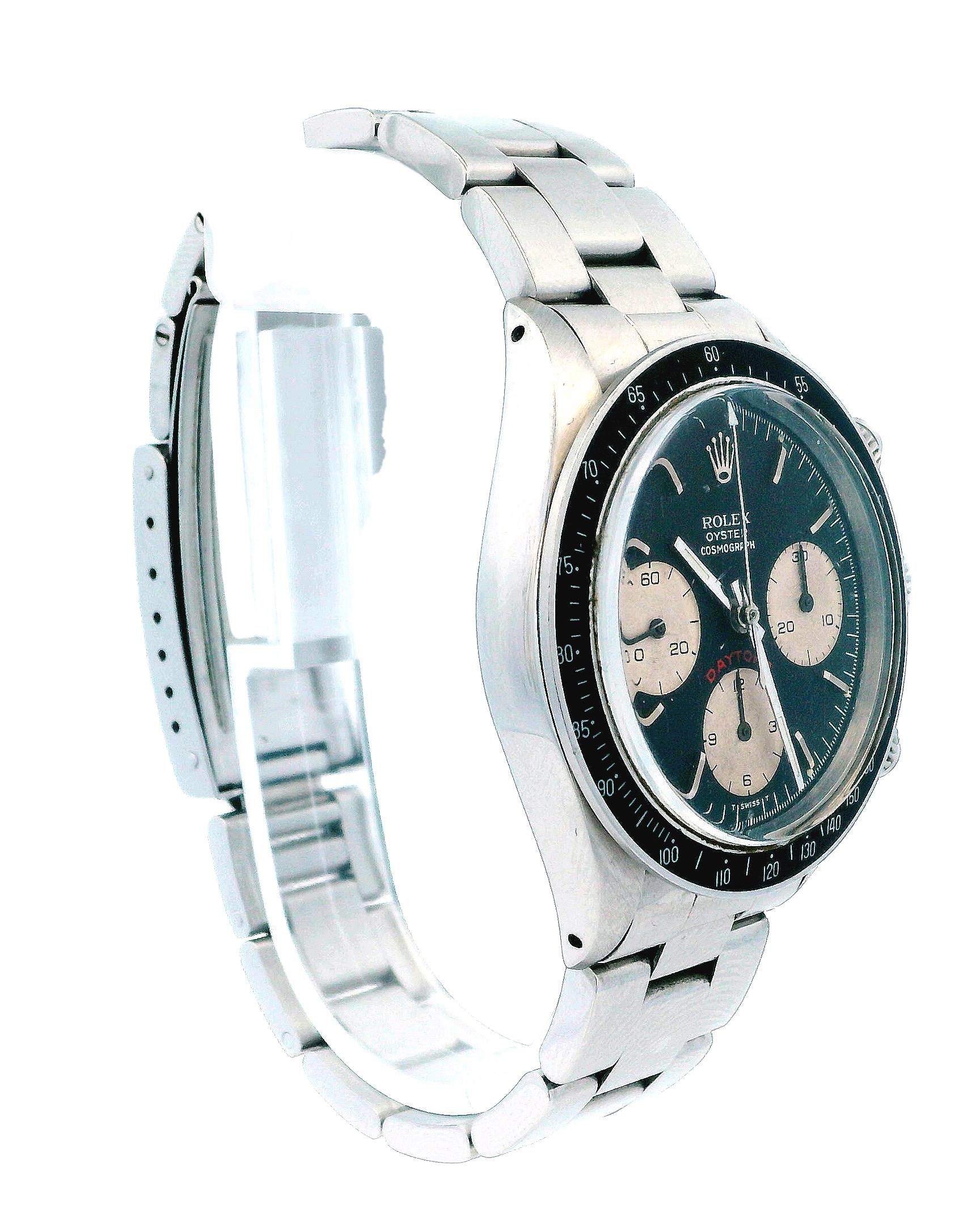 Rolex Daytona 6263 Mens Watch. 37mm stainless steel case. Black acrylic bezel with tachymetric scale. Black dial with steel hands and index hour markers. Minute markers on the outer dial. Three sub-dials. Small seconds hand at 9 o'clock. 30-minute