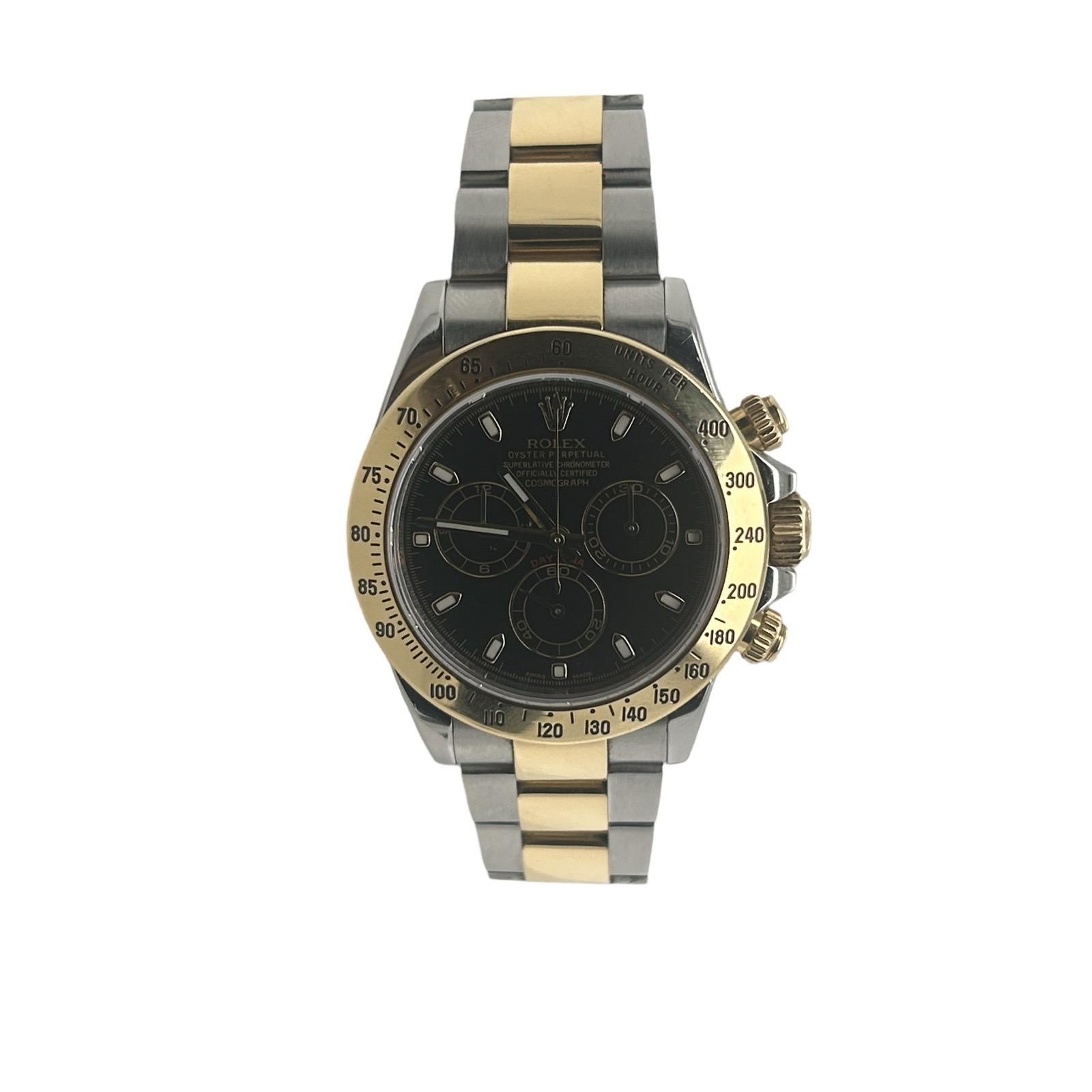 Brand: Rolex
Model: Daytona 
Reference: 116523
Year: 2014
Dial: Black
Band Material: 18k Yellow Gold/ Stainless Steel
Case: Stainless steel
Bezel: 18kt Yellow Gold
Box/Papers: Box yes, Papers yes
Included: Brilliance Jewels lifetime guarantee of