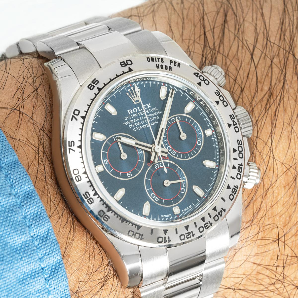 An unworn white gold Daytona from Rolex, featuring a blue dial with chronograph counters. The watch also features an engraved tachymetric scale and three pushers, designed to be the ultimate timing tool for endurance racing drivers.

The Oyster