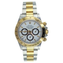 Montre-bracelet Rolex Daytona Chronographe Oystersteel et or jaune 18Kt