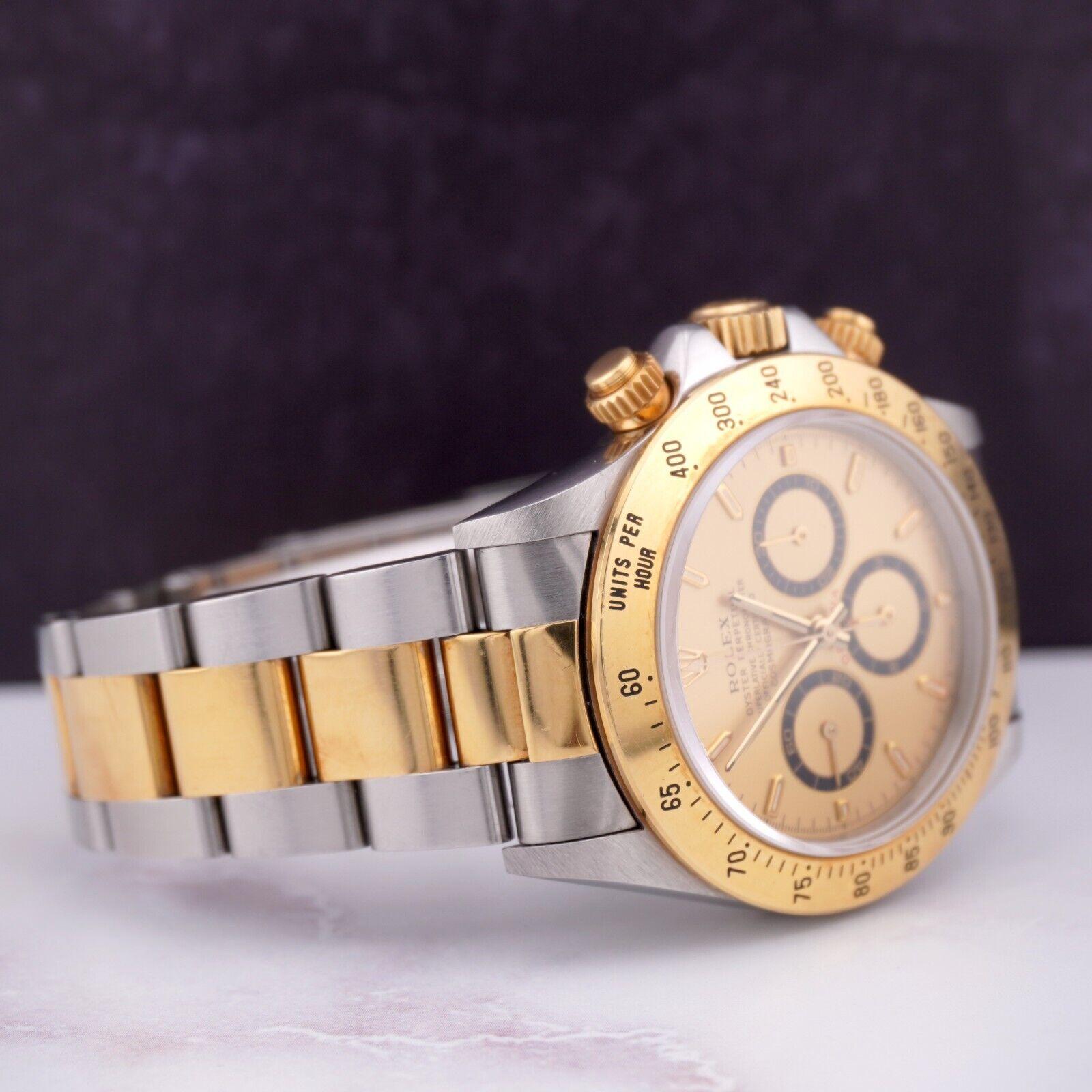 Rolex Daytona 40mm Watch. A Pre-owned watch w/ Gift Box. Watch is 100% Authentic and Comes with Authenticity Card. Watch Reference is 16523 and is in Excellent Condition (See Pictures). The dial color is Gold and material is 18k Yellow Gold. Watch
