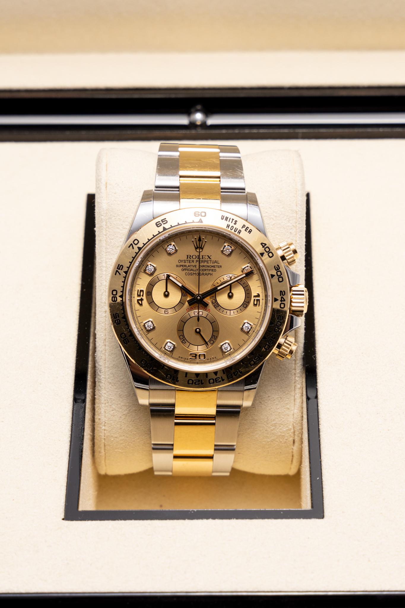 The watch is in a very good condition and it’s working well. It shows slight signs of wear and scratches. The watch comes with an AGS Jewelry wooden box, along with an AGS Jewelry warranty card. For more information about delivery, warranty and
