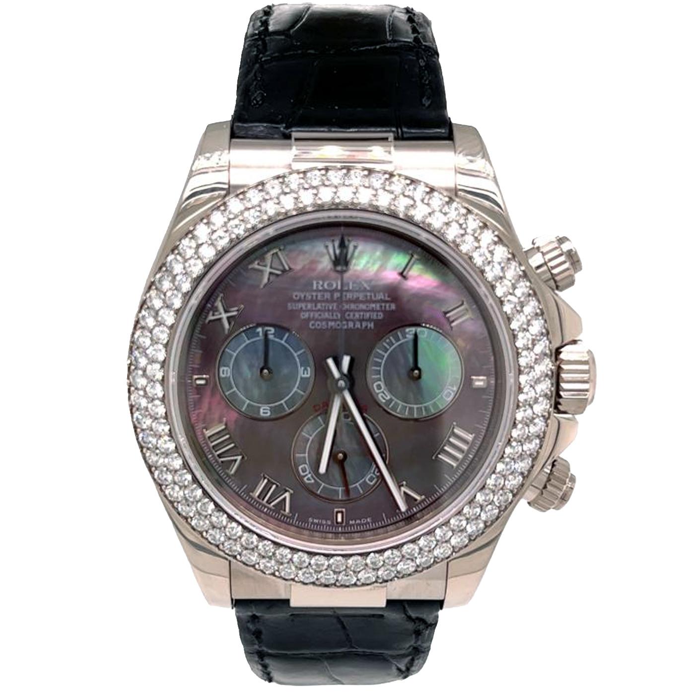 An Oyster Perpetual Daytona Gents Wristwatch, mother of pearl dial set with round brilliant cut diamond hour markers, a fixed 18k white gold bezel set with approximately 124 round cut diamonds, an original Black leather strap with an oyster lock