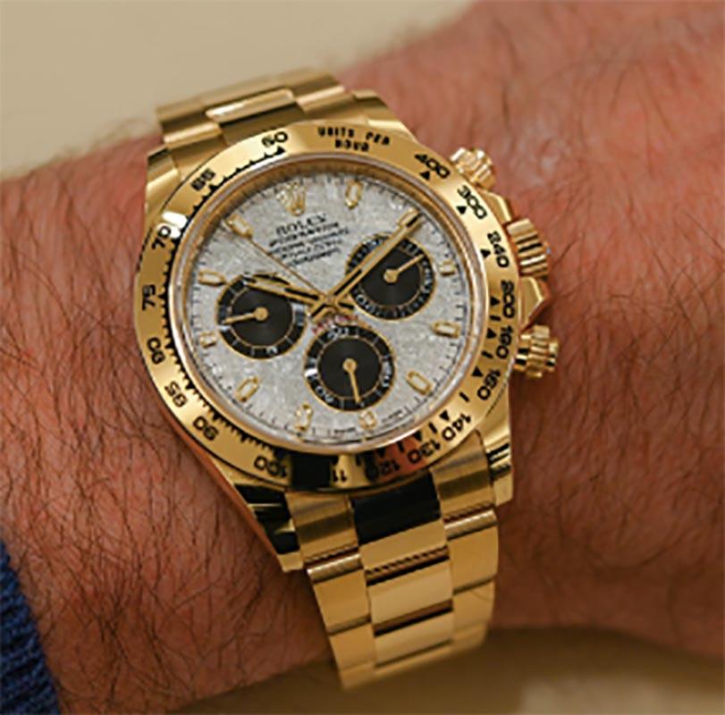 rolex daytona 18k gold price