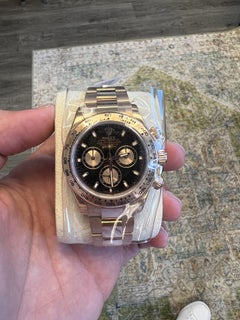 Rolex Daytona MINT Rose Black Dial Box Papers