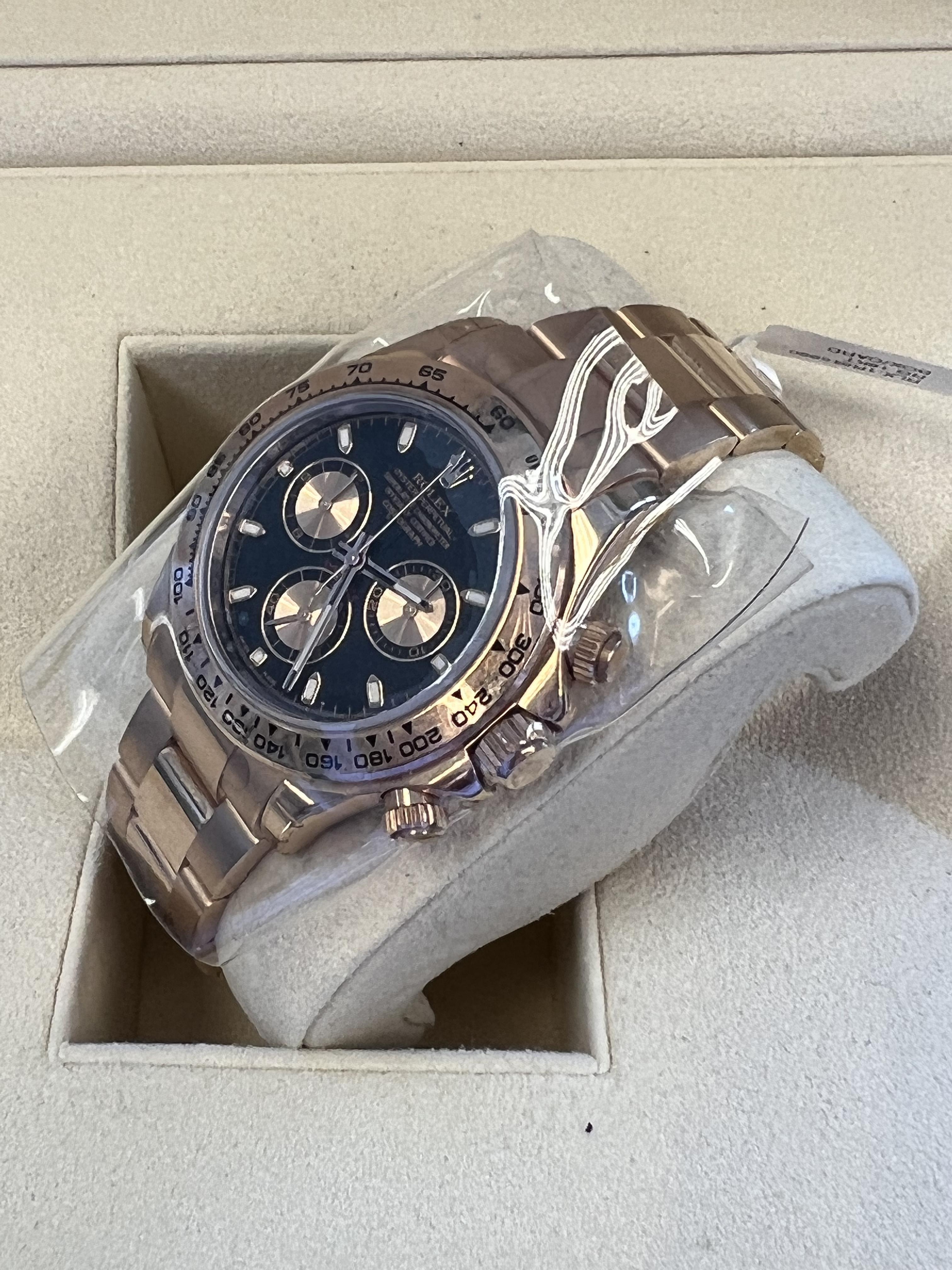 Contemporary Rolex Daytona MINT Rose Black Dial Box Papers For Sale