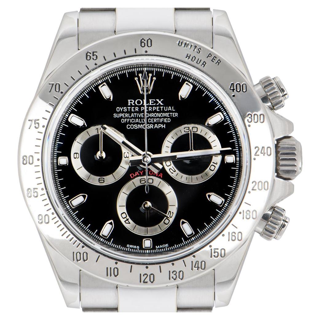 The predecessor to the 116500LN, this unworn stainless steel Cosmograph Daytona NOS by Rolex. Featuring a unique APH error black dial, a tachymetric scale, three chronograph counters and pushers, the Daytona was designed to be the ultimate timing