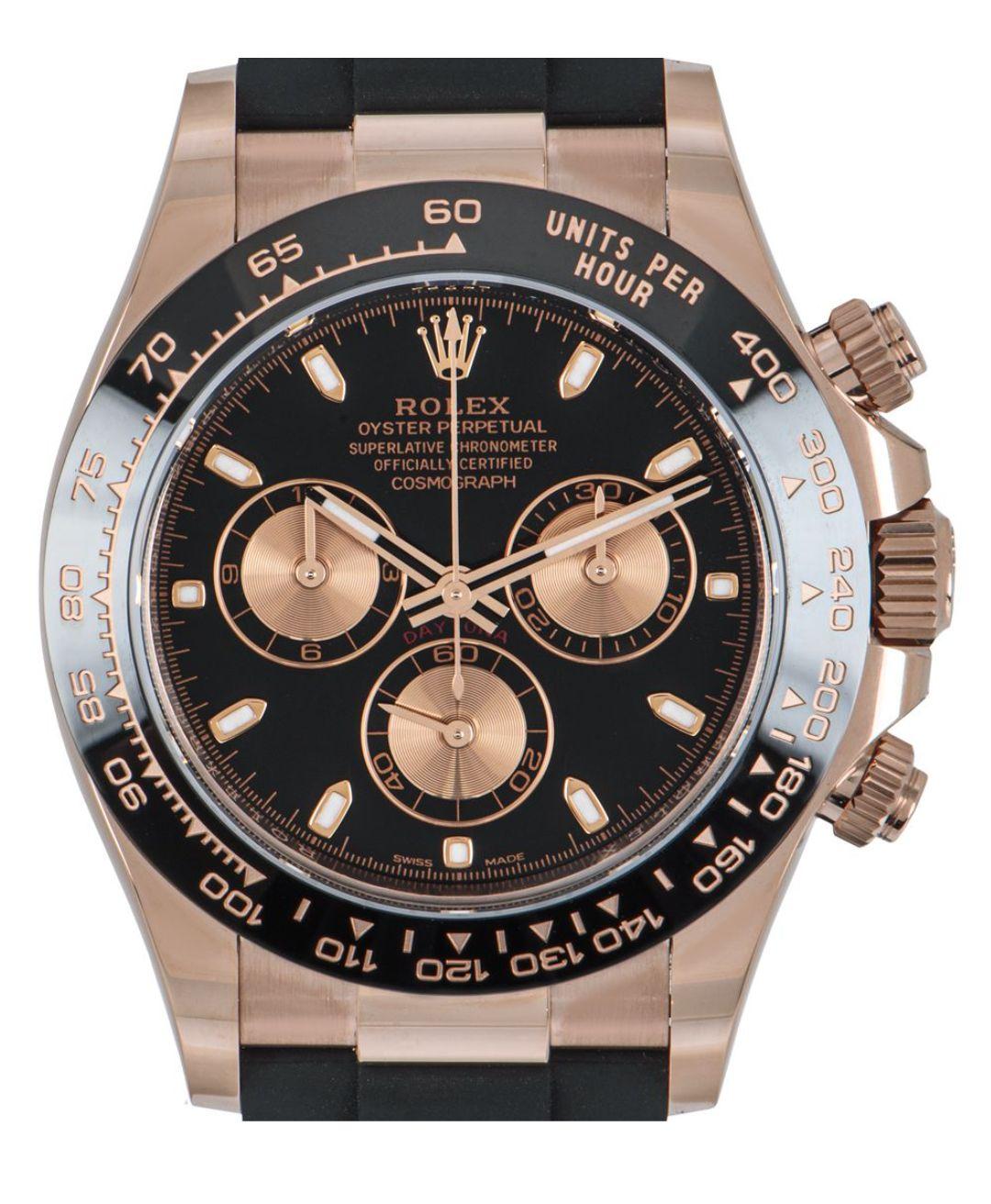 A rose gold Daytona by Rolex, with a black and pink dial. Featuring a black ceramic bezel with a tachymetric scale, three counters and pushers; this high performance chronograph was designed to be the ultimate timing tool for endurance racing
